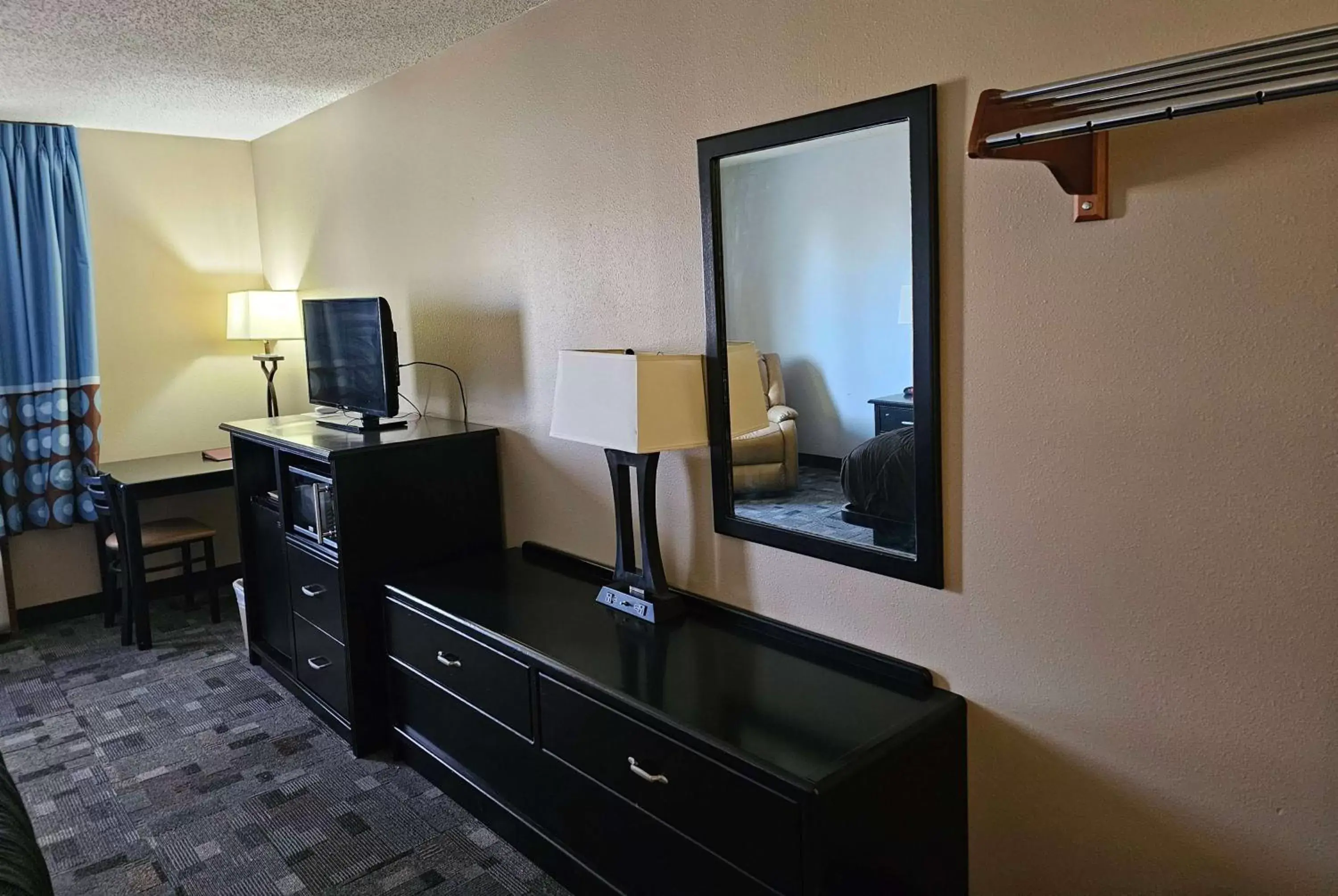 Photo of the whole room, TV/Entertainment Center in Super 8 by Wyndham Estherville