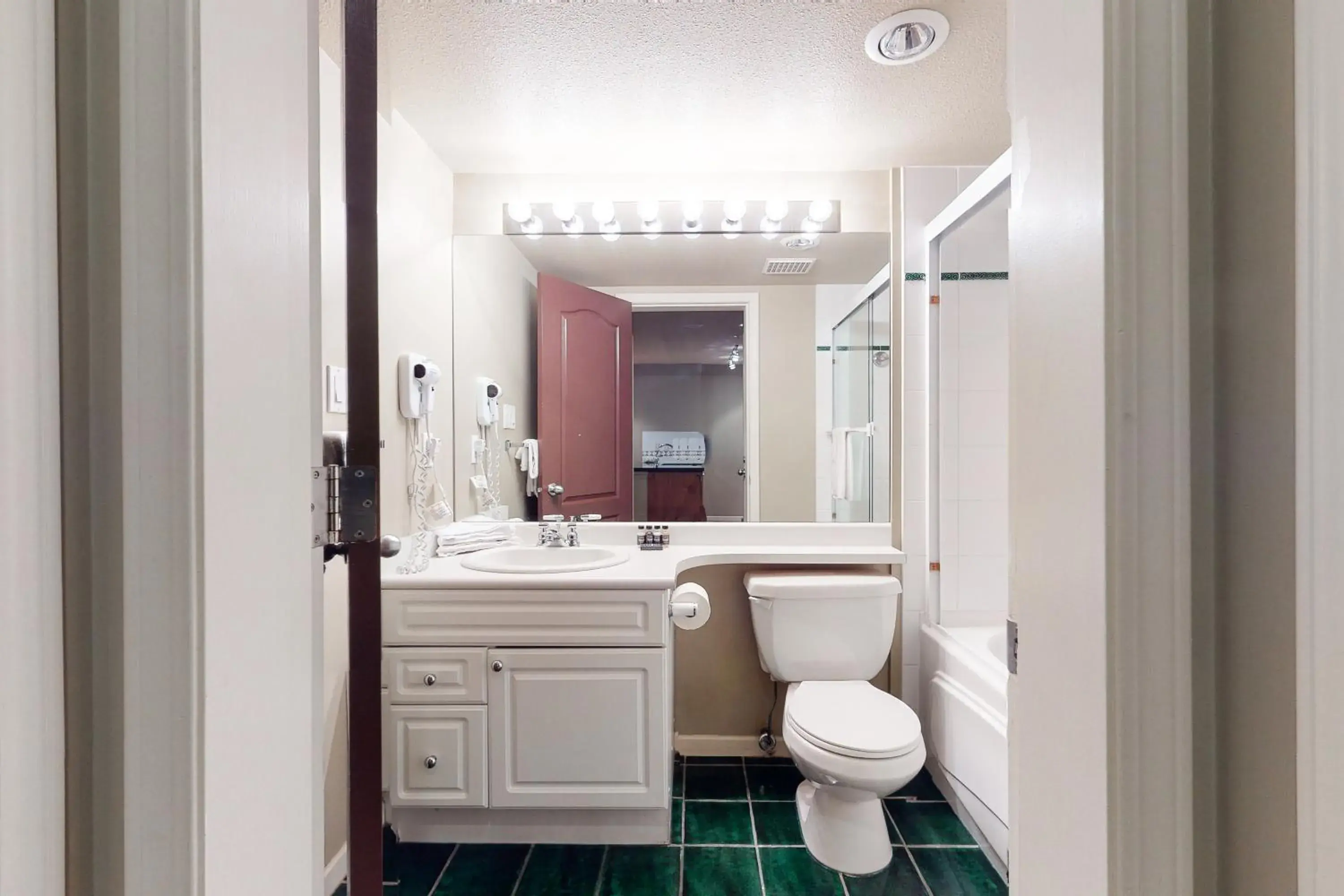 Bathroom in Town Plaza Suites