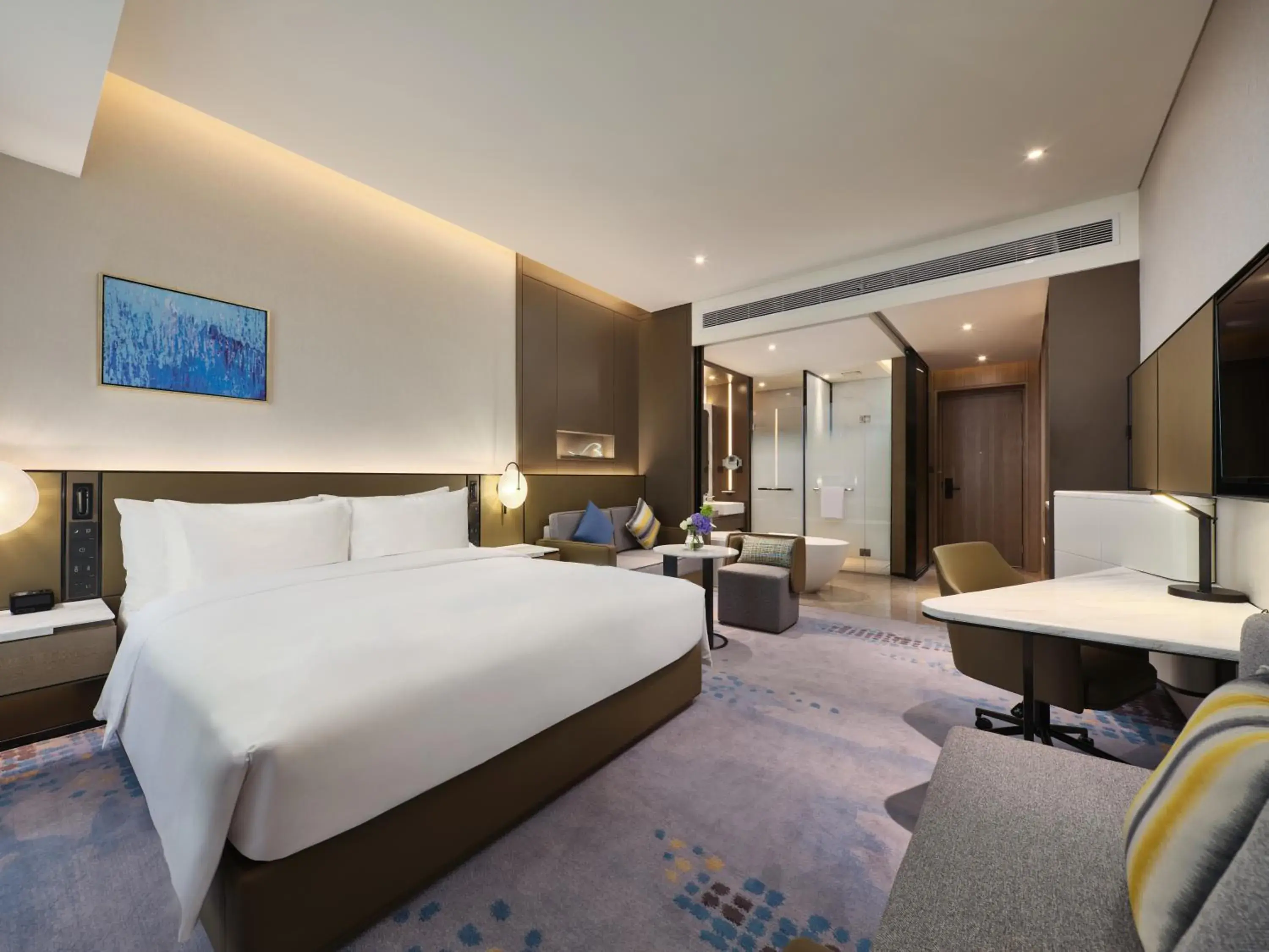 Bed in Crowne Plaza Wuhan Development Zone, an IHG Hotel