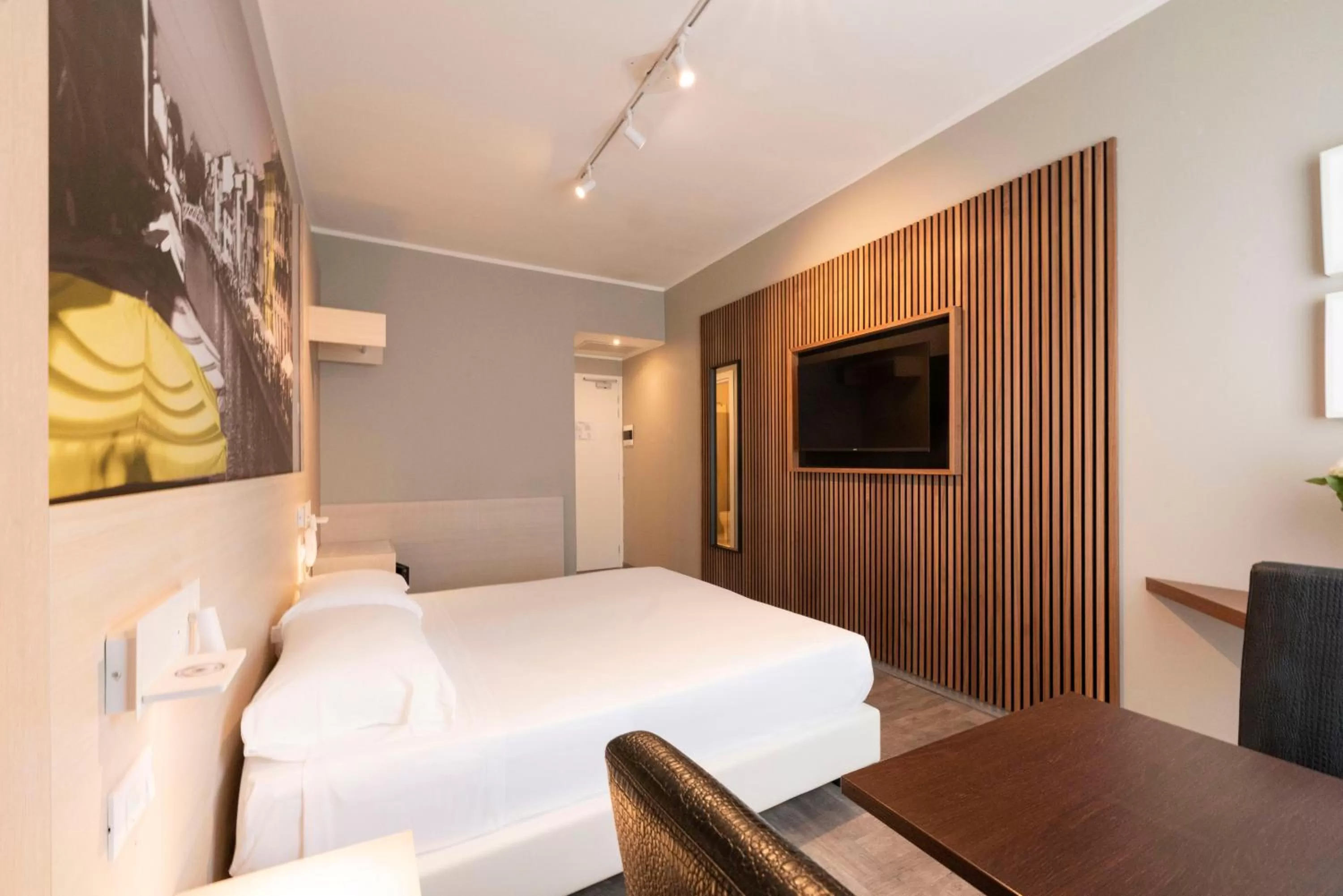 Bed in Kleos Hotel Milano Città Studi by Kleos Group Collection