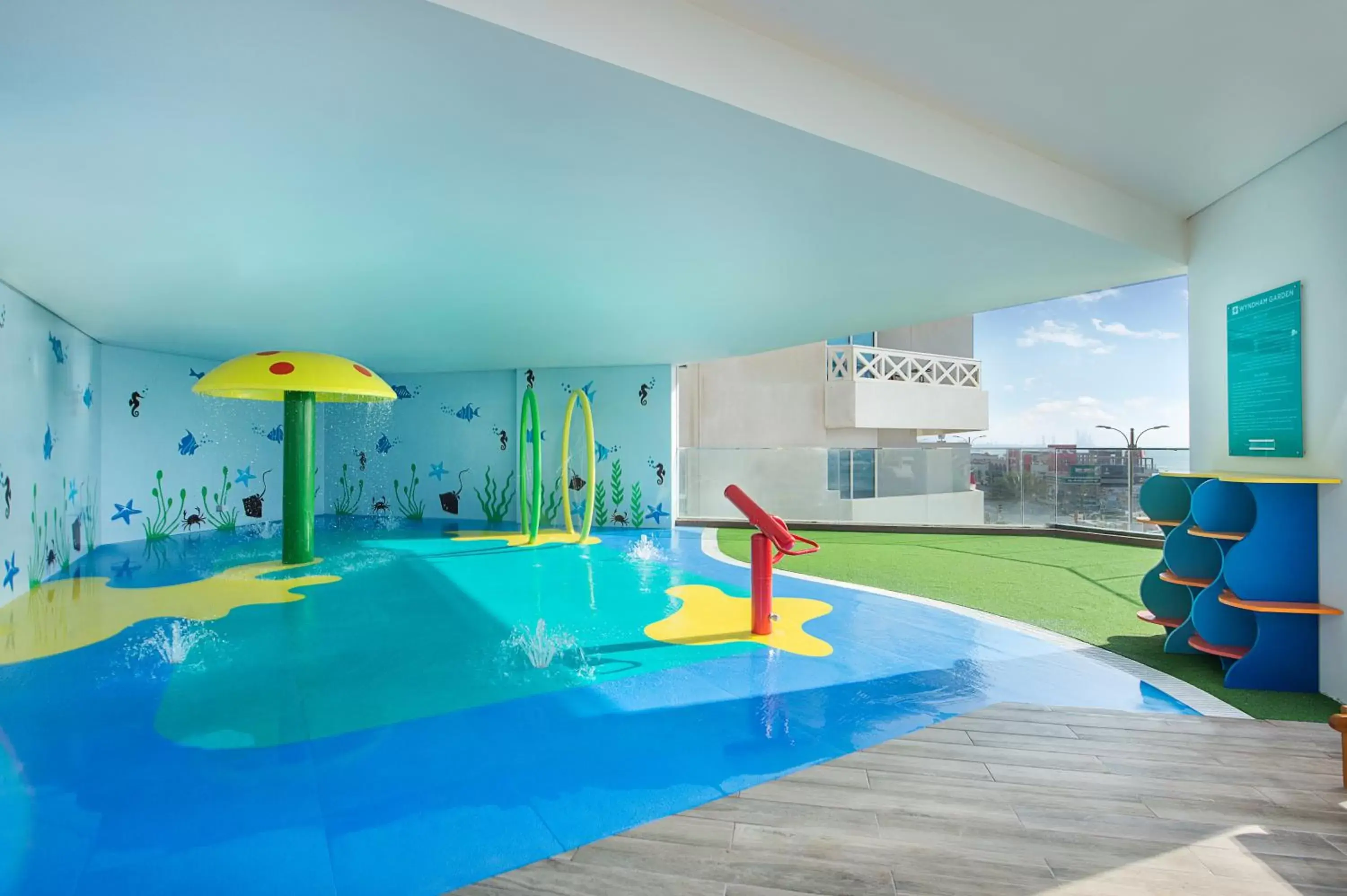 Kids's club, Swimming Pool in Wyndham Garden Ajman Corniche