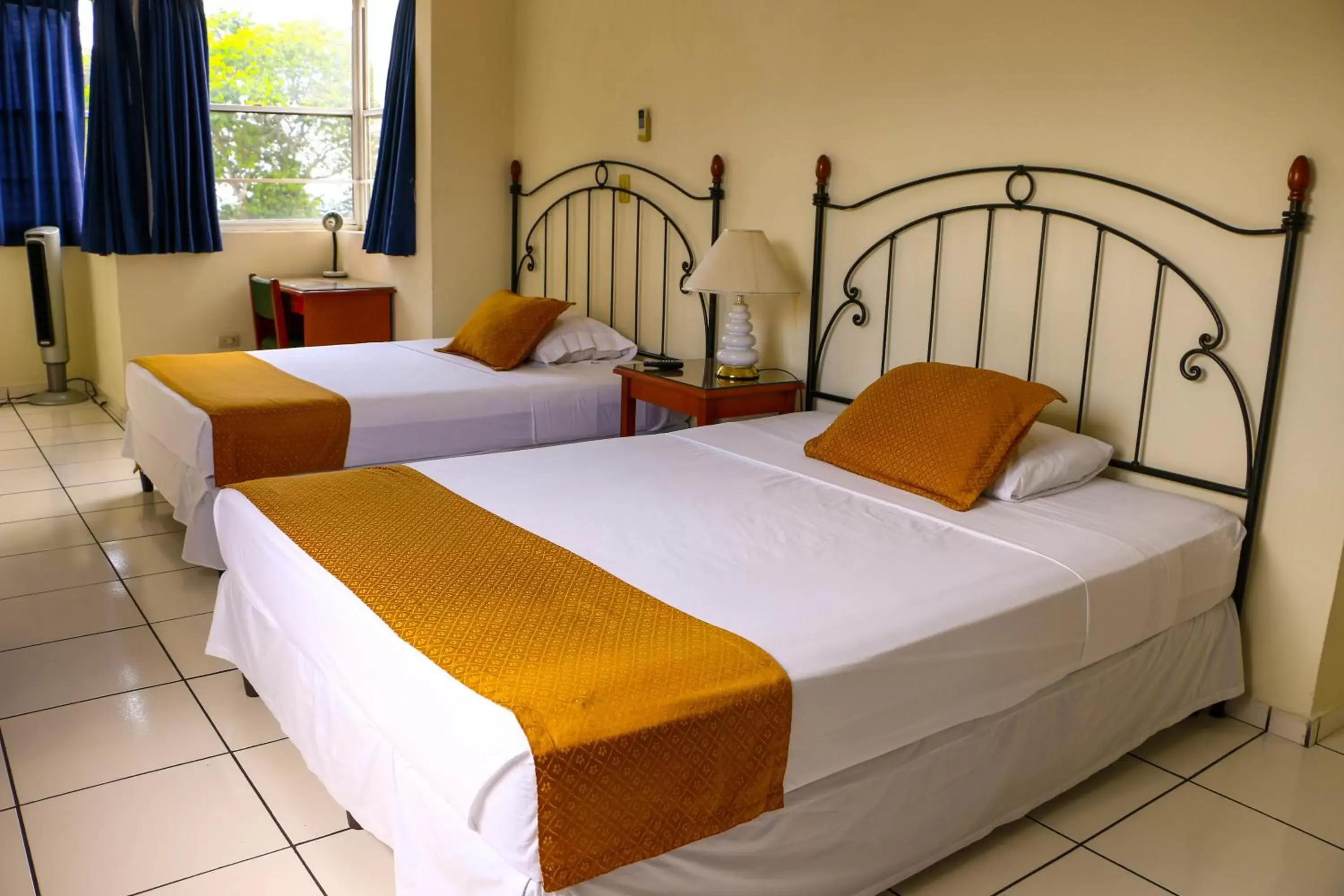 Bedroom, Bed in Hotel Villa Serena San Benito Bedroom, Bed in Hotel Villa Serena San Benito