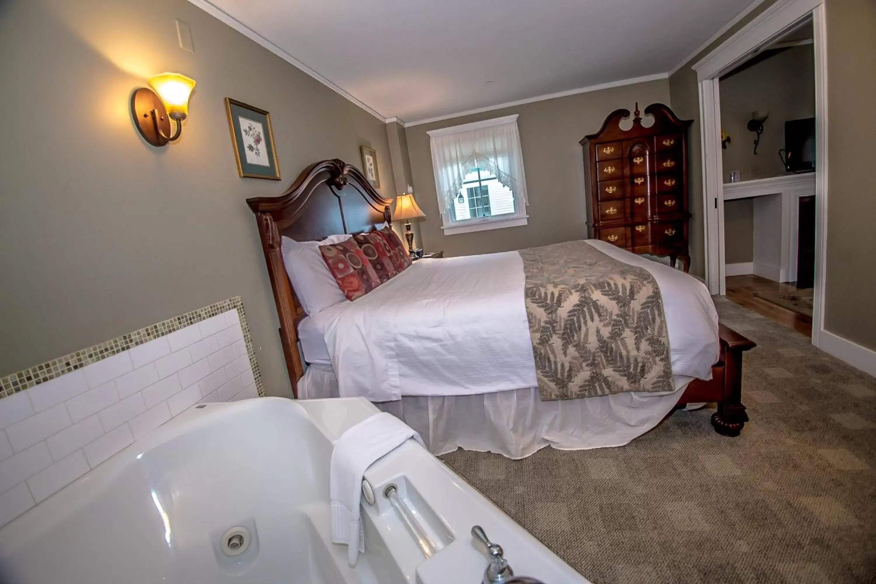 Bedroom in Cranmore Inn and Suites, a North Conway boutique hotel