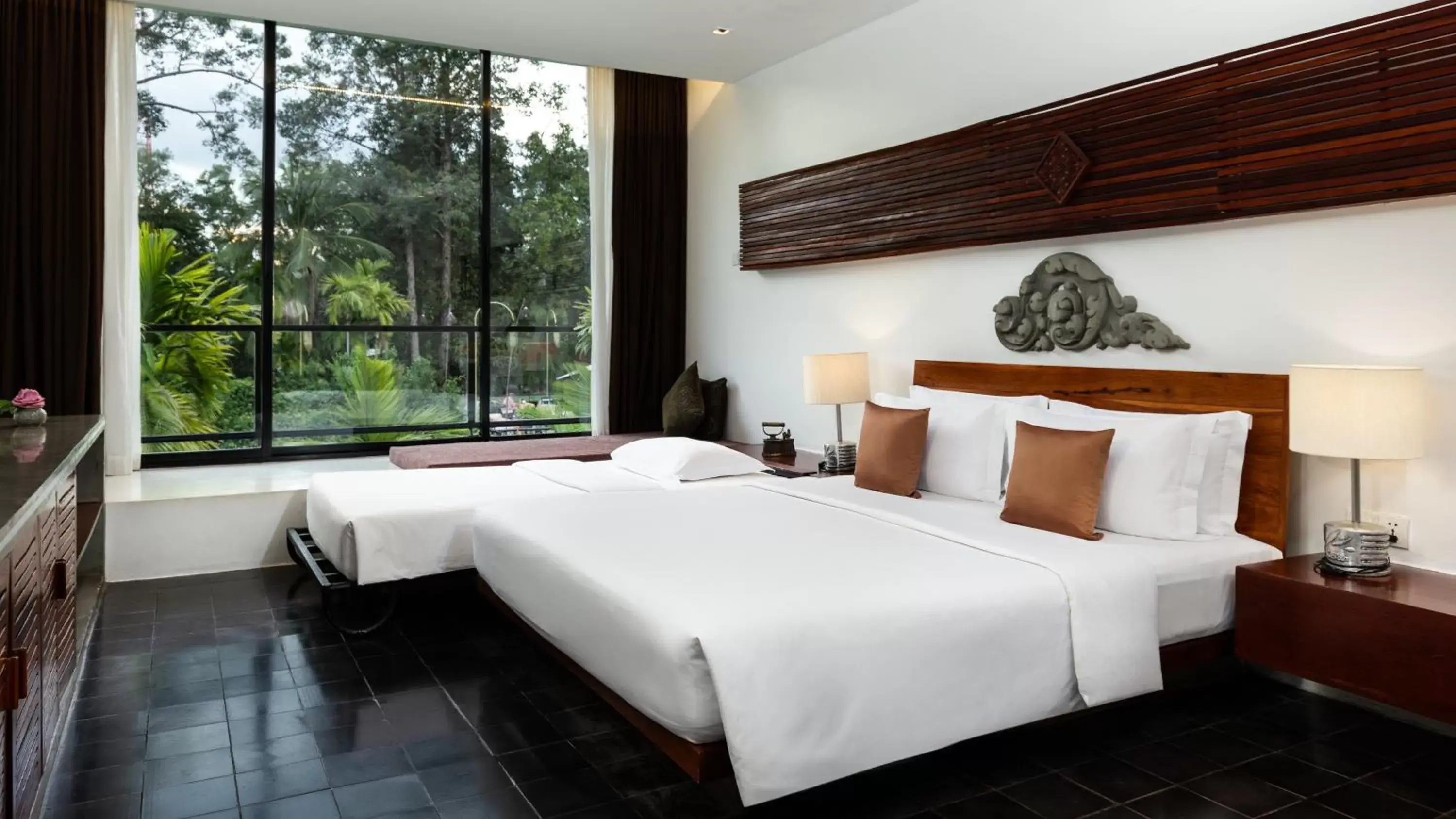 Bed in Lynnaya Urban River Resort