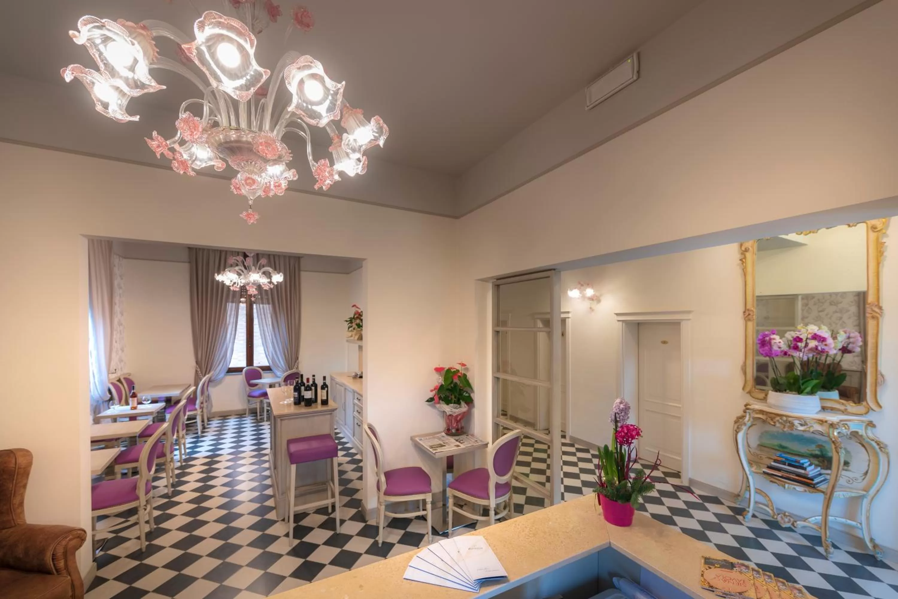 Communal lounge/ TV room in Villa Elda Boutique Hotel