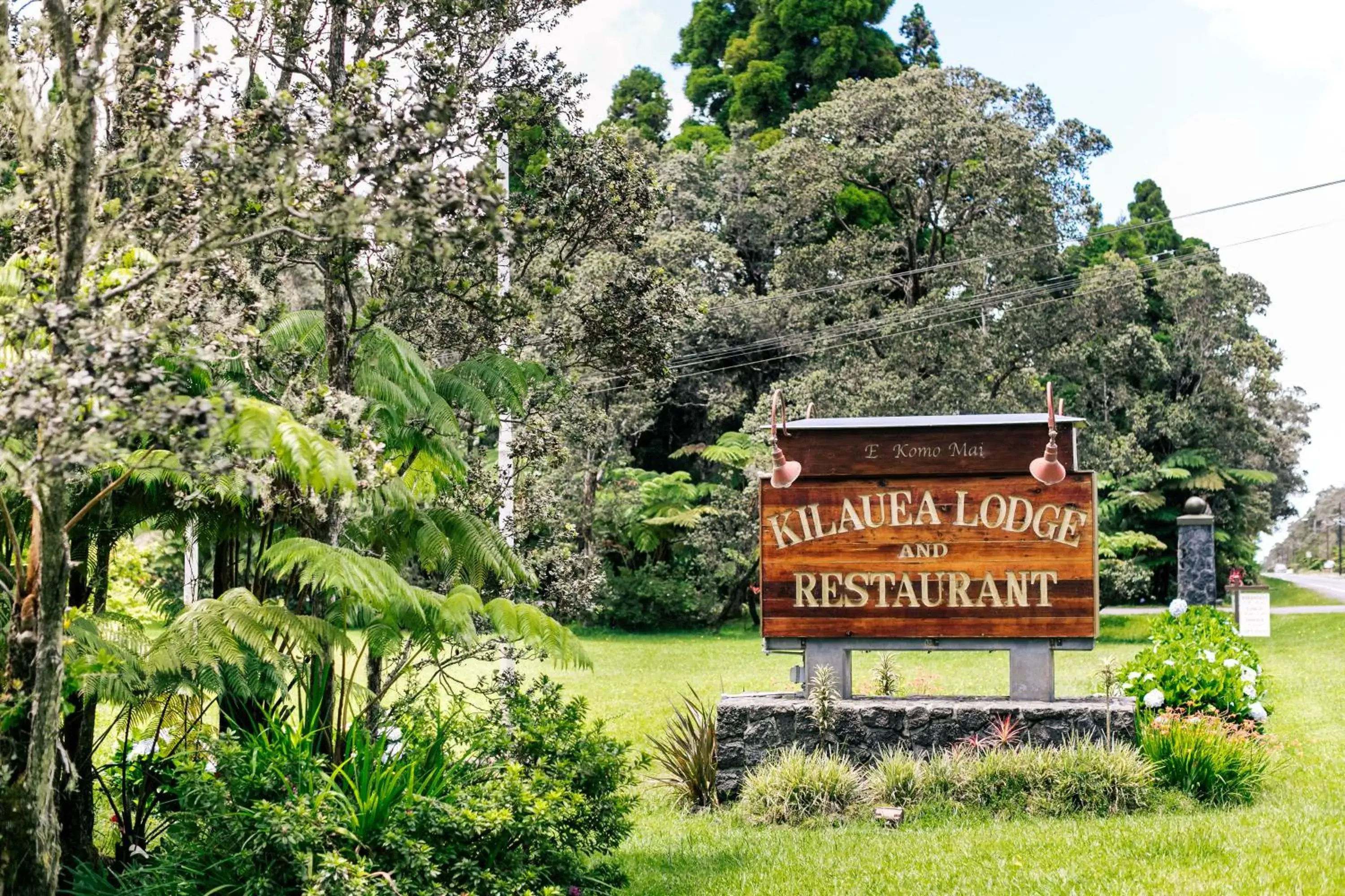 Property logo or sign in Kilauea Lodge and Restaurant