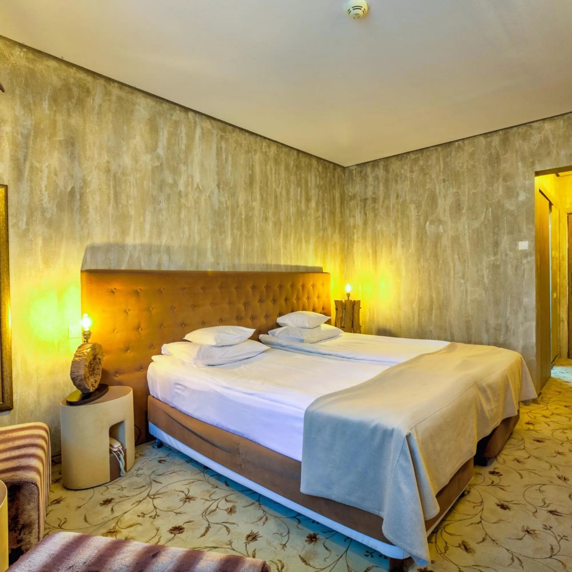 Bed in Alpin Resort Hotel