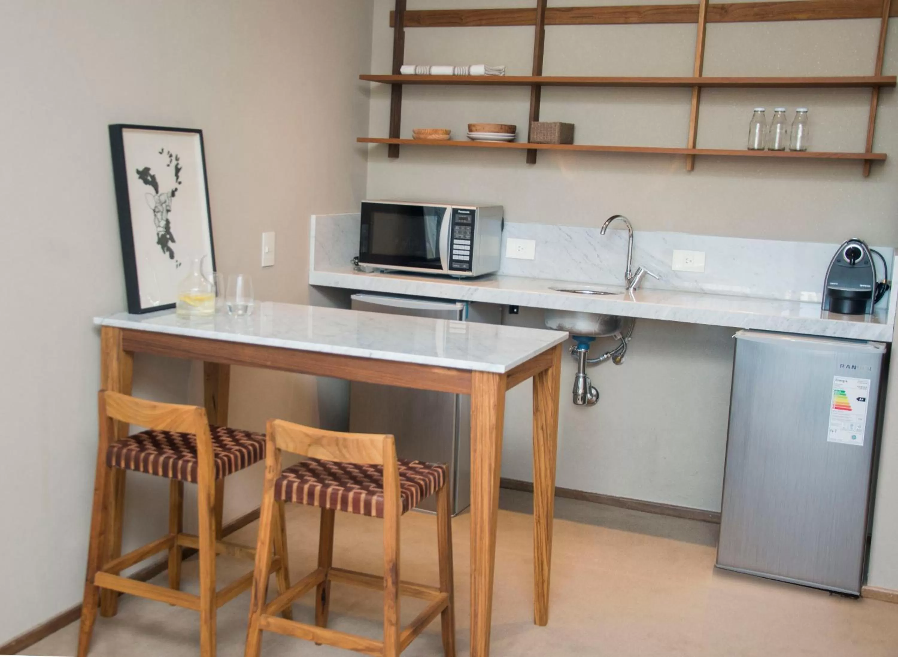 Kitchen or kitchenette in AQ Tailored Suites