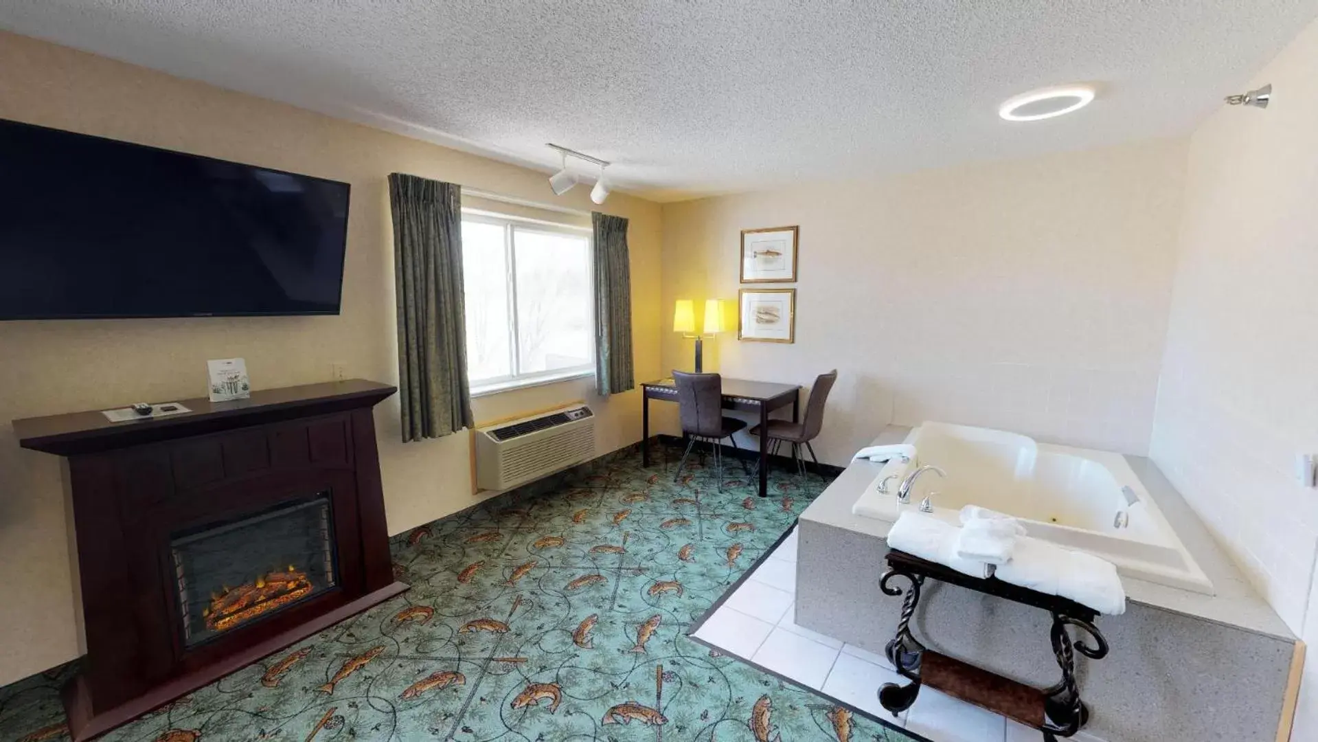 Photo of the whole room, TV/Entertainment Center in Stay Wise Inns of Montrose