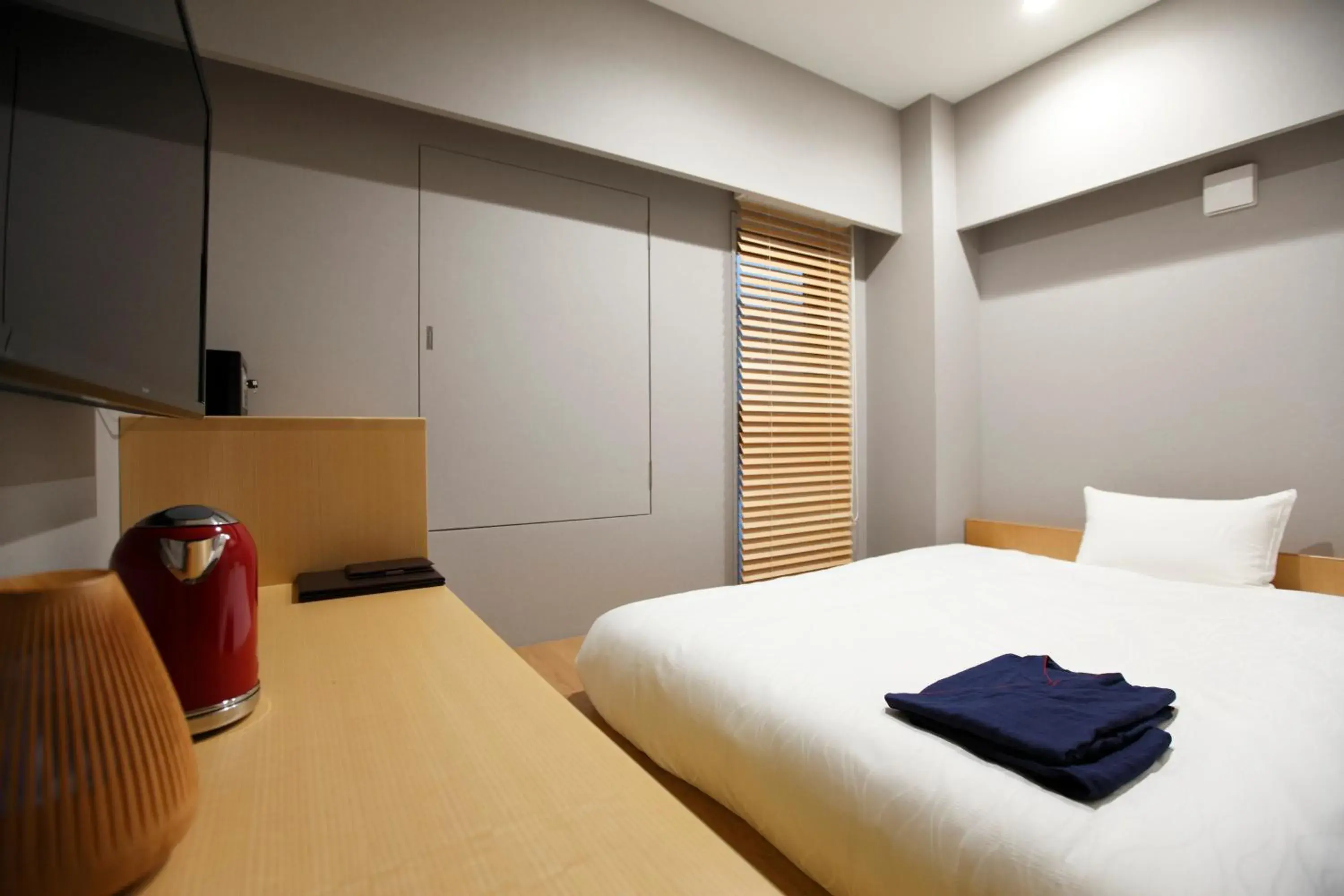 Bed in Hotel Amanek Ginza East
