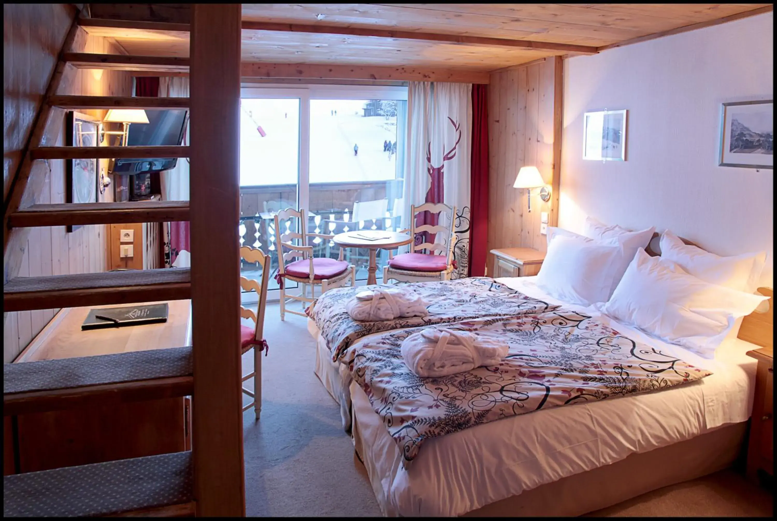 Photo of the whole room in Chalet-Hotel La Marmotte, La Tapiaz & SPA, The Originals Relais (Hotel-Chalet de Tradition)