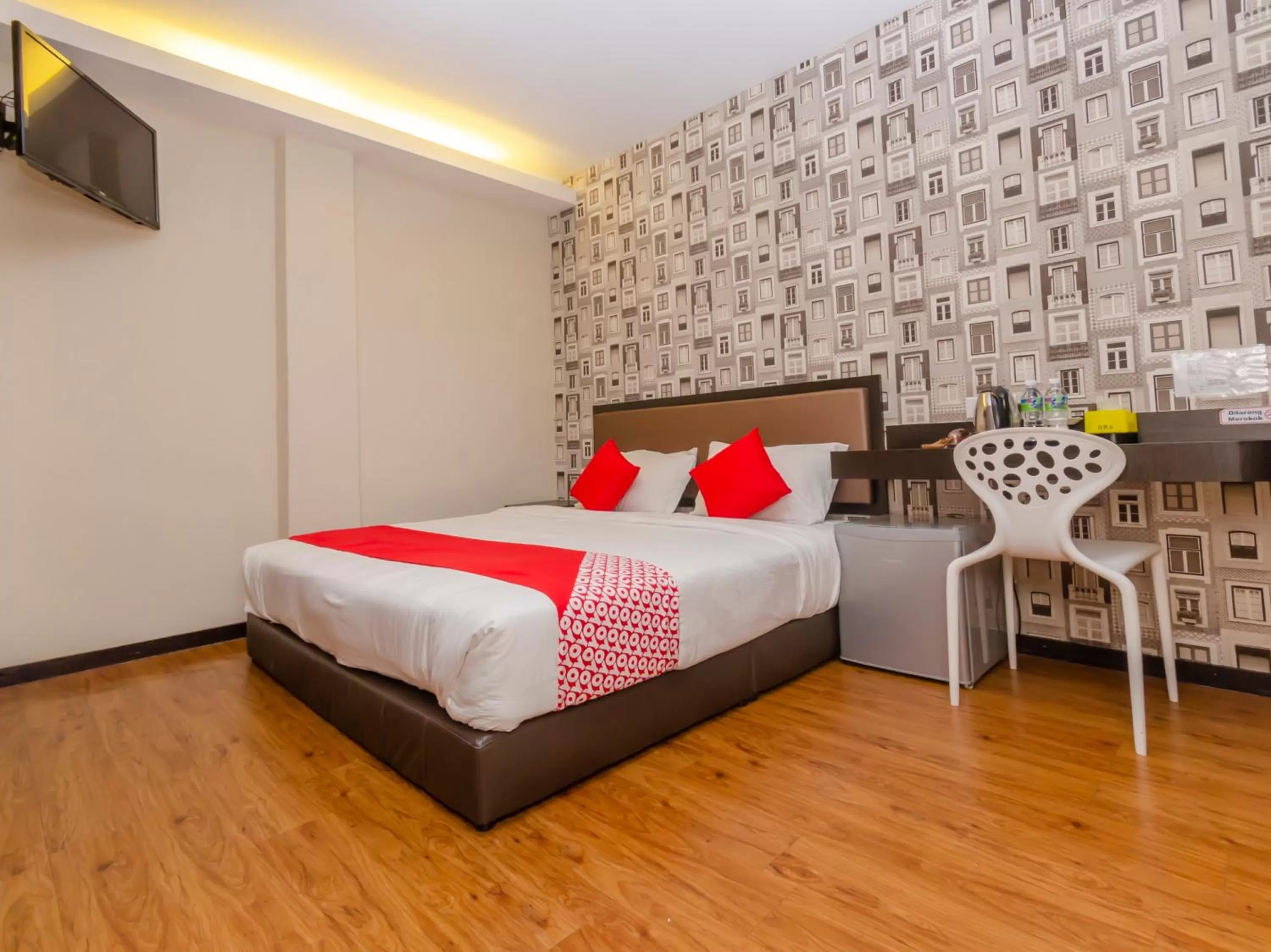 Bedroom in OYO 1214 Oro Hotel