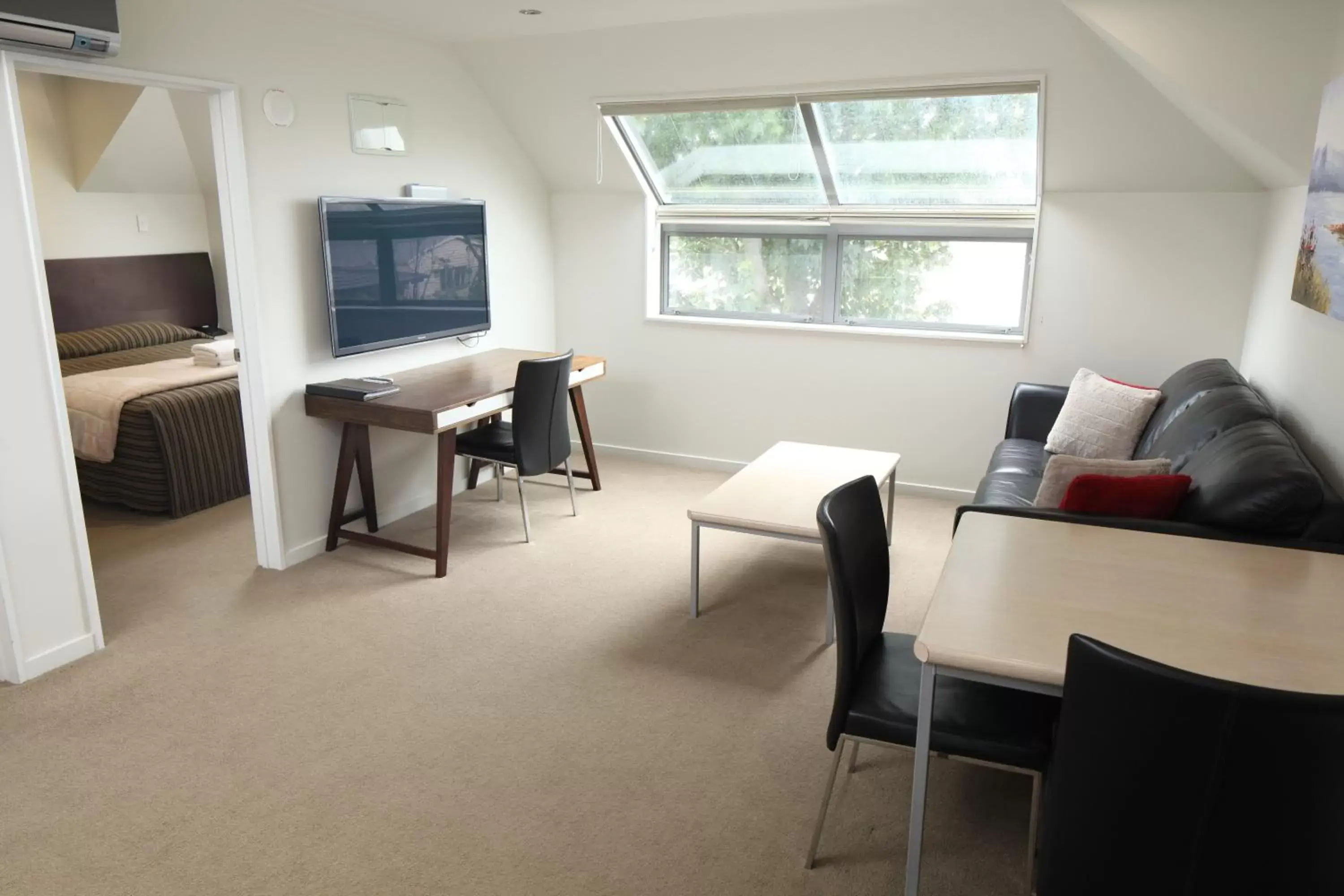 Living room in Alpha Motel with Spa-Bath Living room in Alpha Motel with Spa-Bath