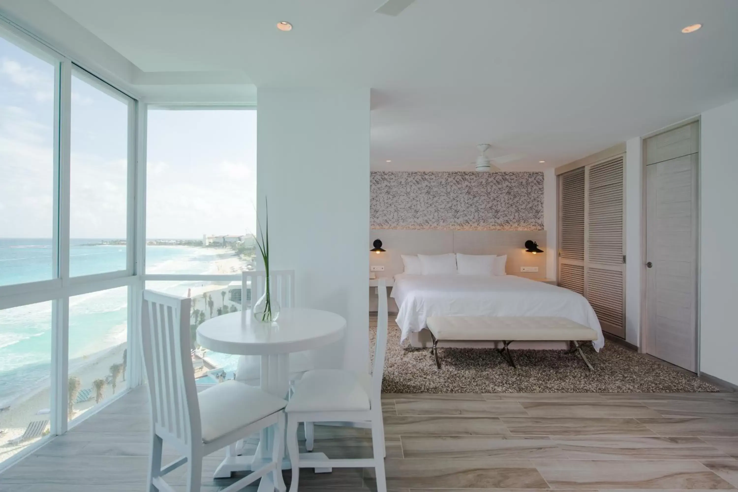 Bedroom in Oleo Cancun Playa Boutique All Inclusive Resort