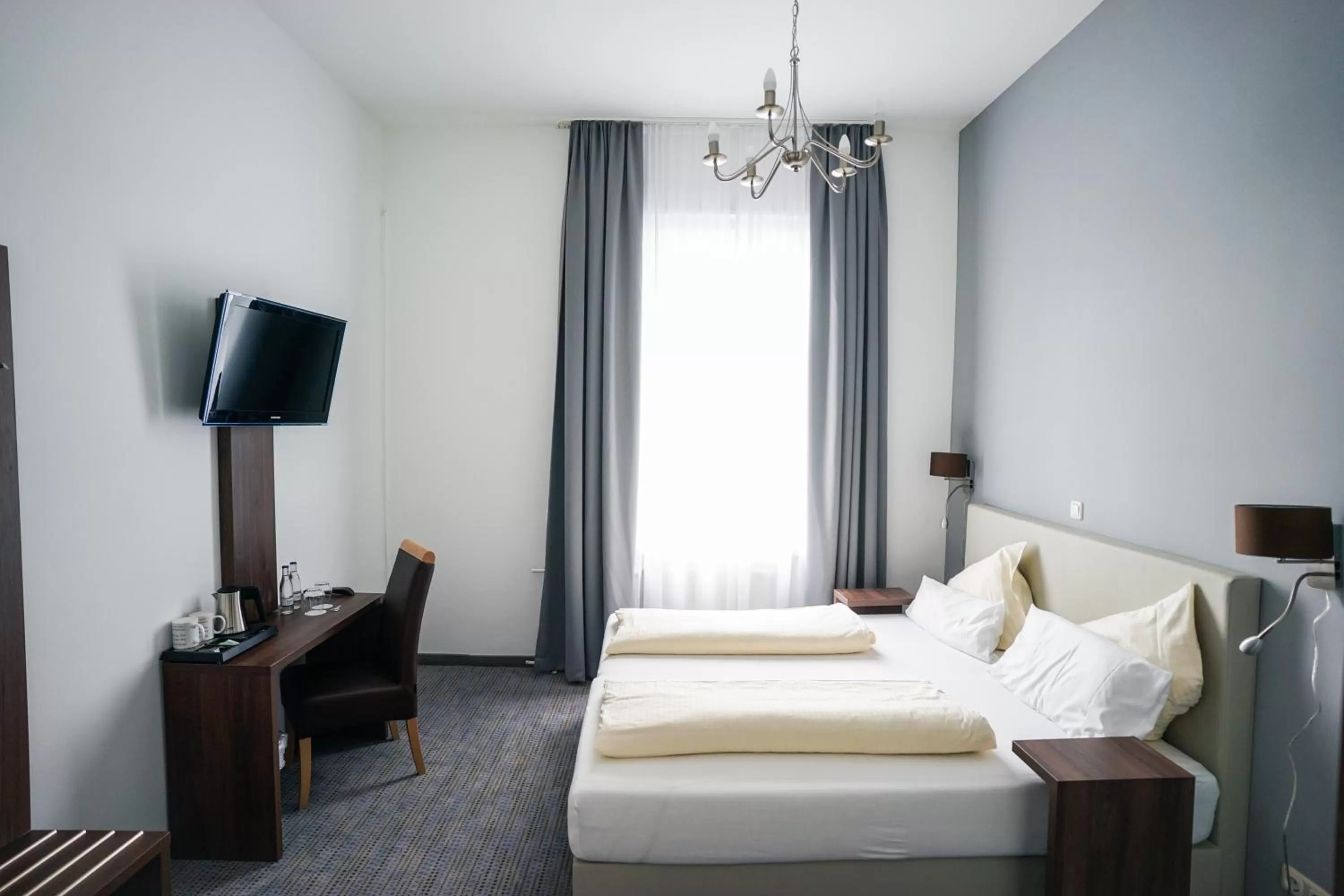 Bed in Hotel Am Schloss Biebrich