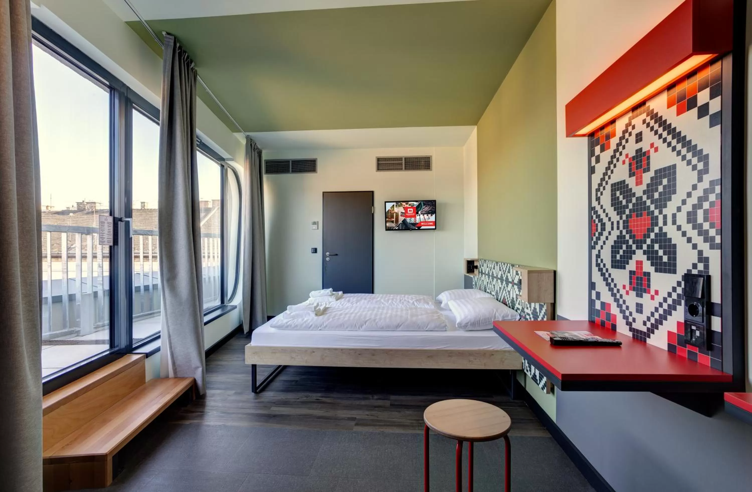 Photo of the whole room, Bed in MEININGER Budapest Great Market Hall