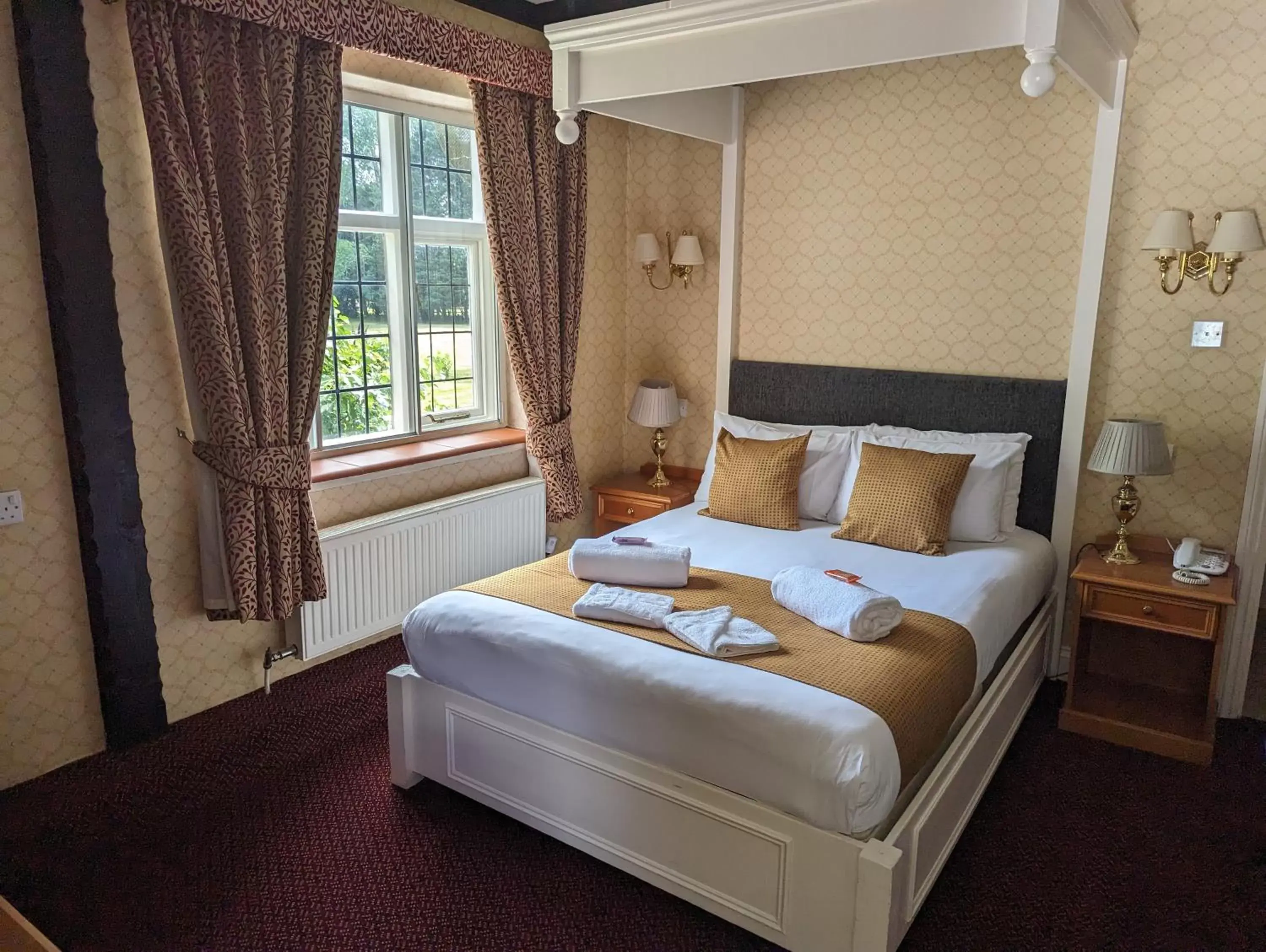 Bed in Howfield Manor Hotel