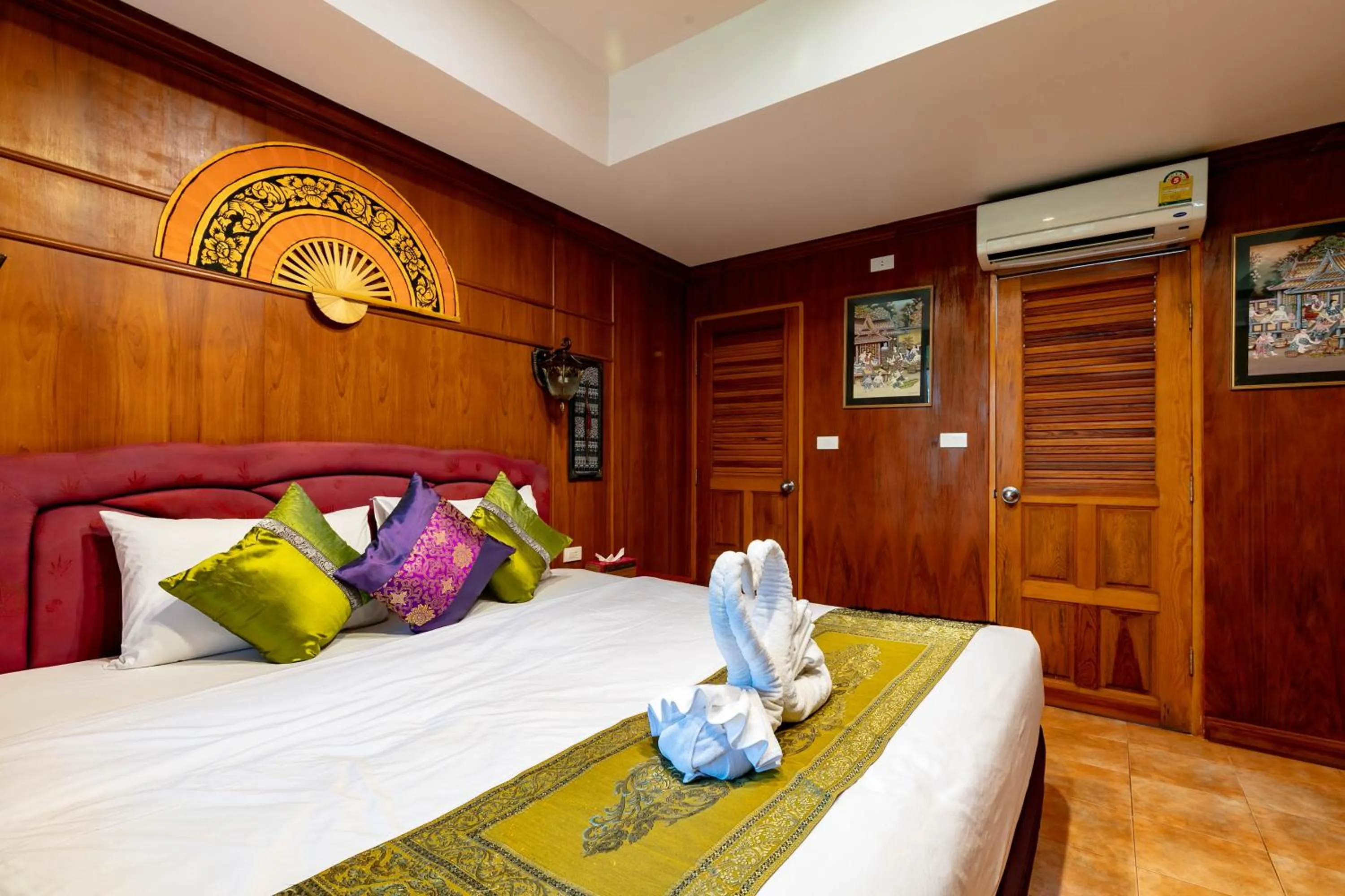 Bedroom, Bed in Royal Phawadee Village Patong - 2 Minutes walk to the beach