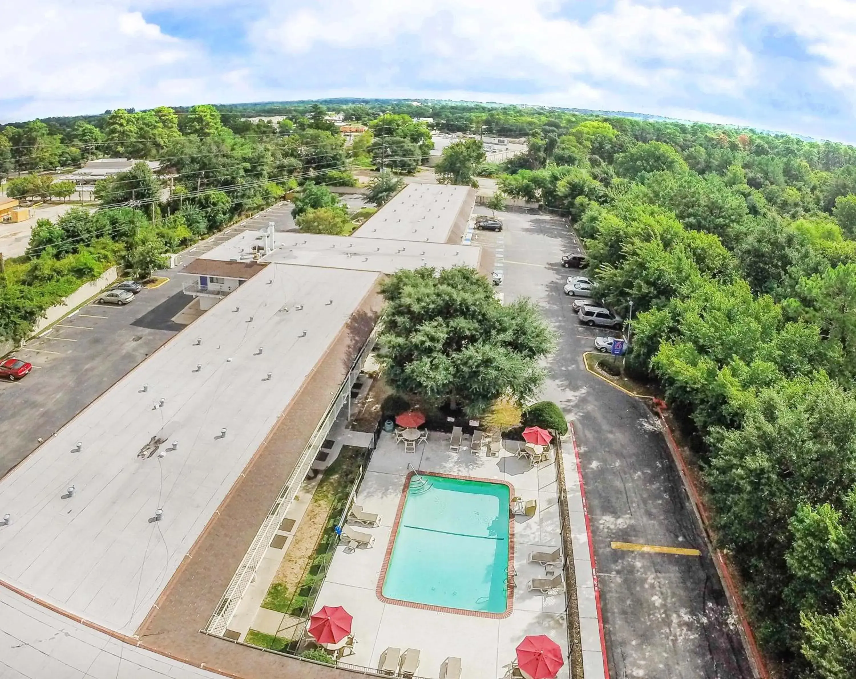 Swimming pool, Bird's-eye View in Motel 6-Huntsville, TX