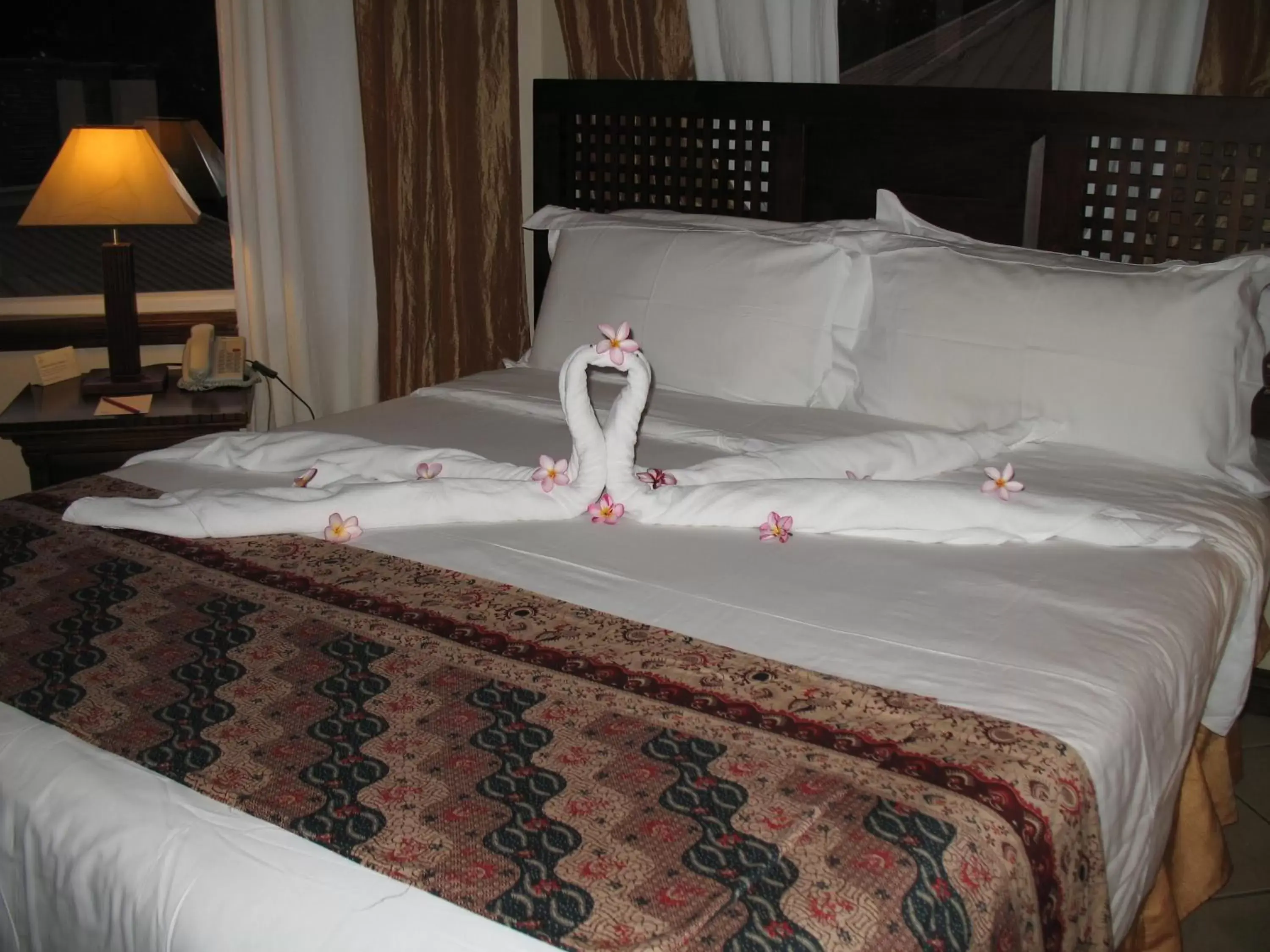 Bed in Aanari Hotel & Spa