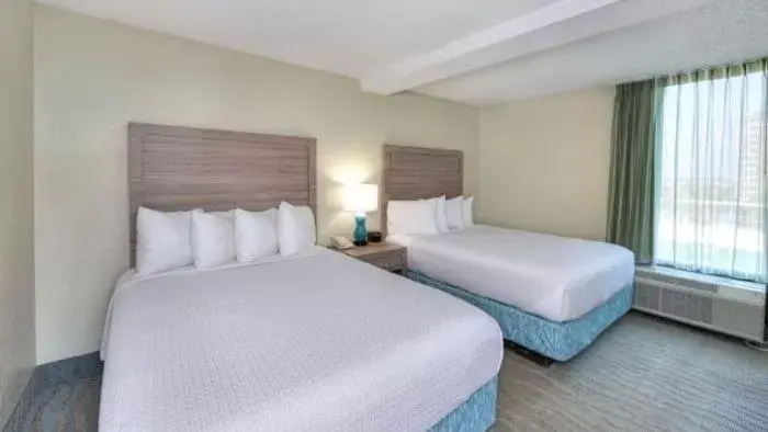 Bedroom, Bed in El Caribe Resort and Conference Center