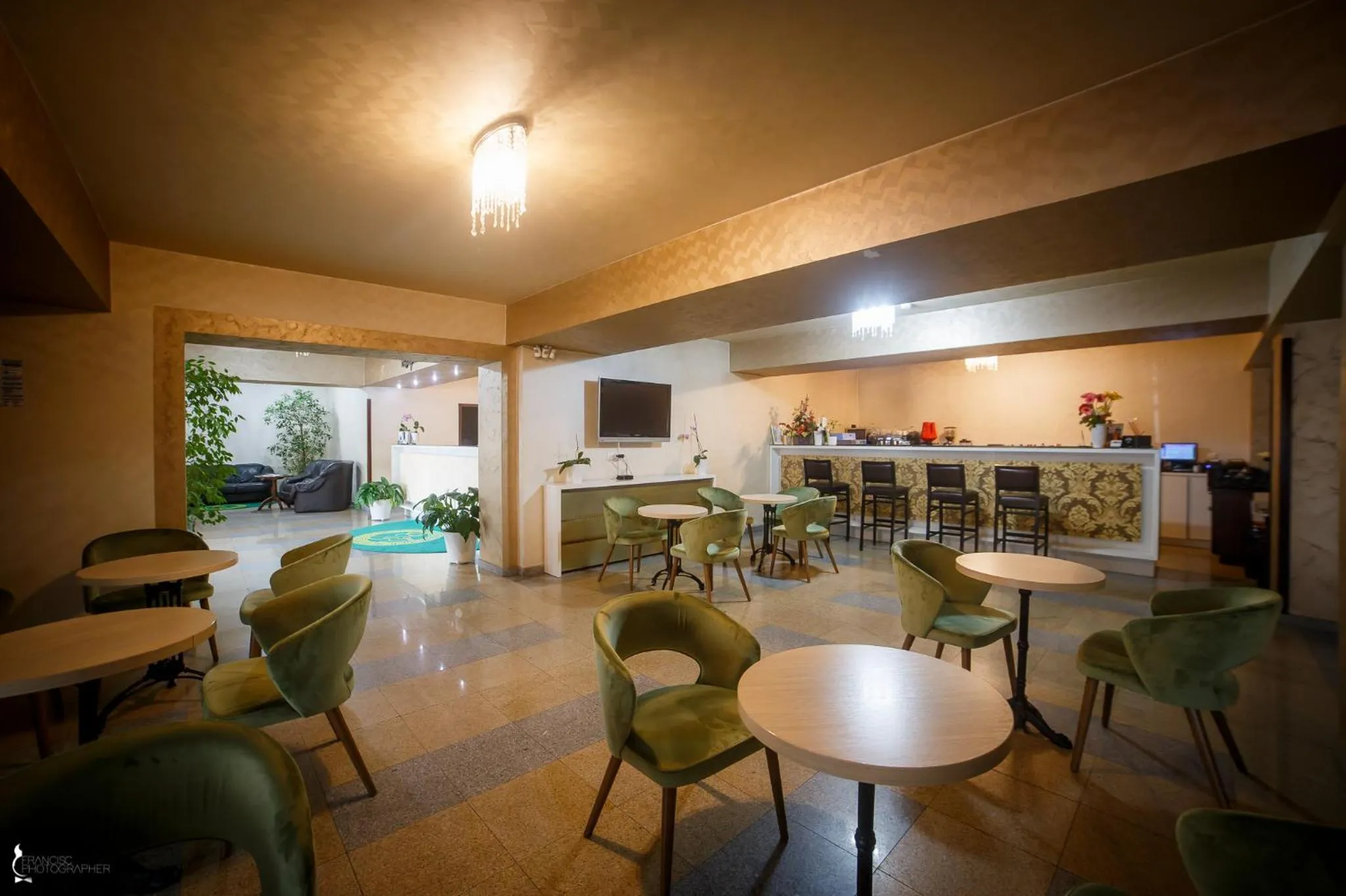 Communal lounge/ TV room in Hotel Ozana