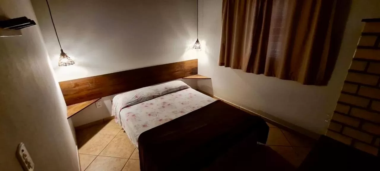 Bed in Pousada dos Sambaquis