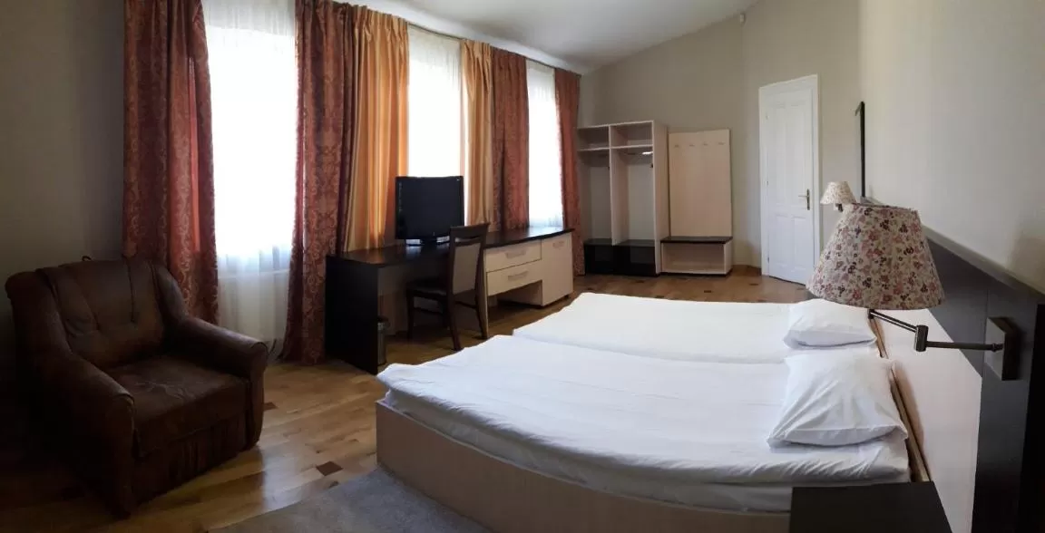 Bed in Mini-Hotel Under The Roof