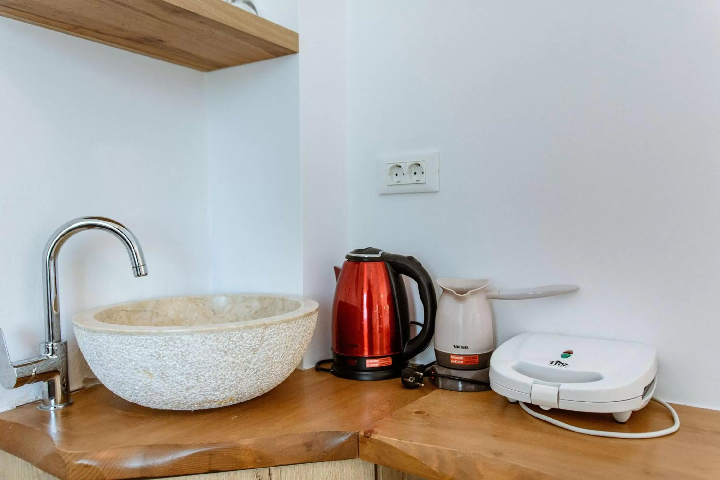 Kitchen or kitchenette in Deluxe Suites