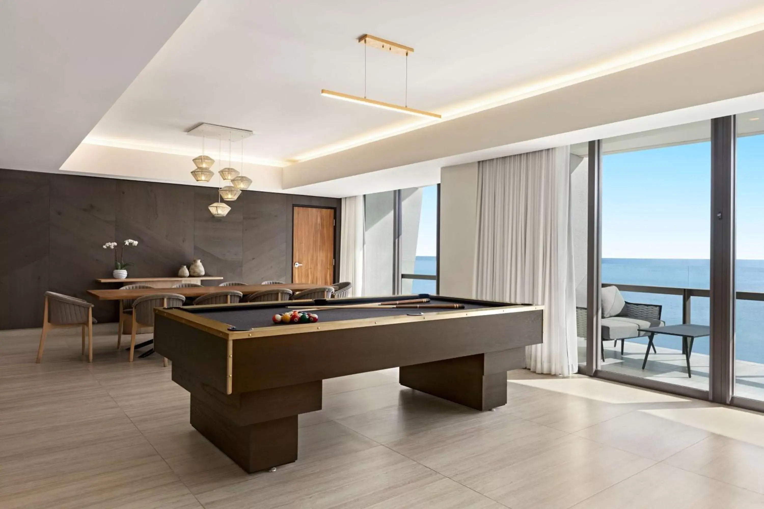 Living room, Billiards in Hilton Cancun, an All-Inclusive Resort