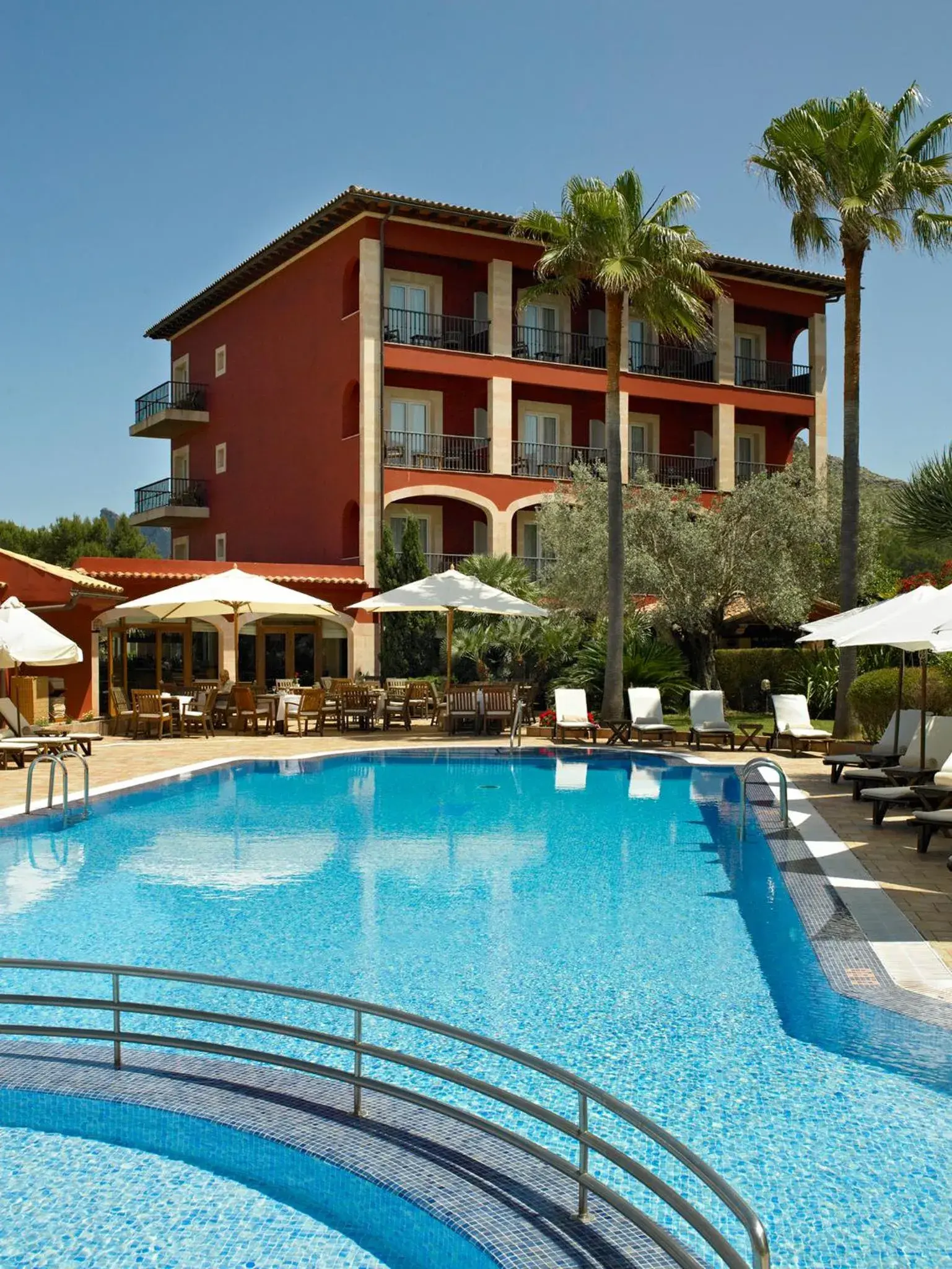 Swimming pool, Property Building in Hotel Cala Sant Vicenc - Adults Only