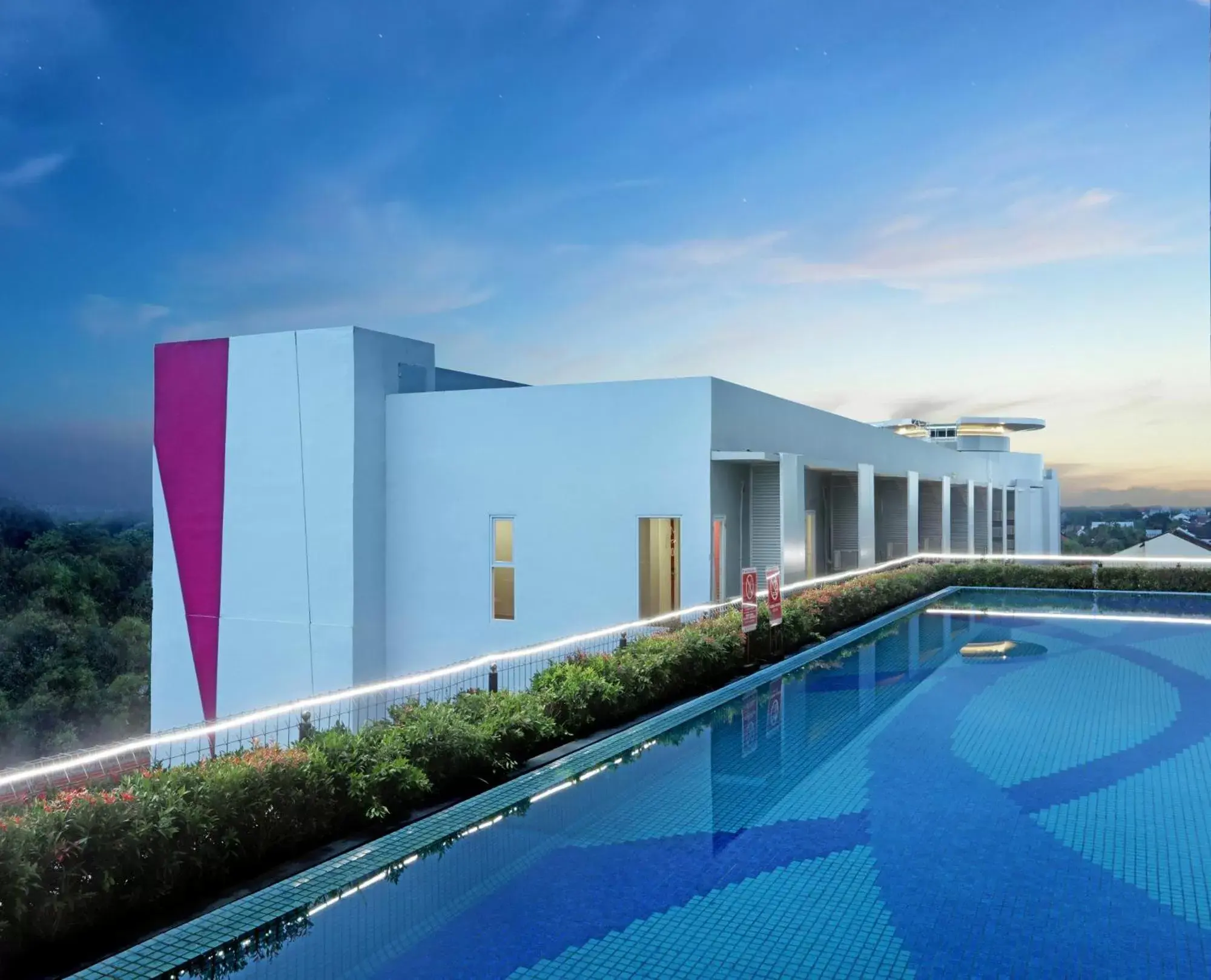 Property building, Swimming Pool in favehotel Madiun