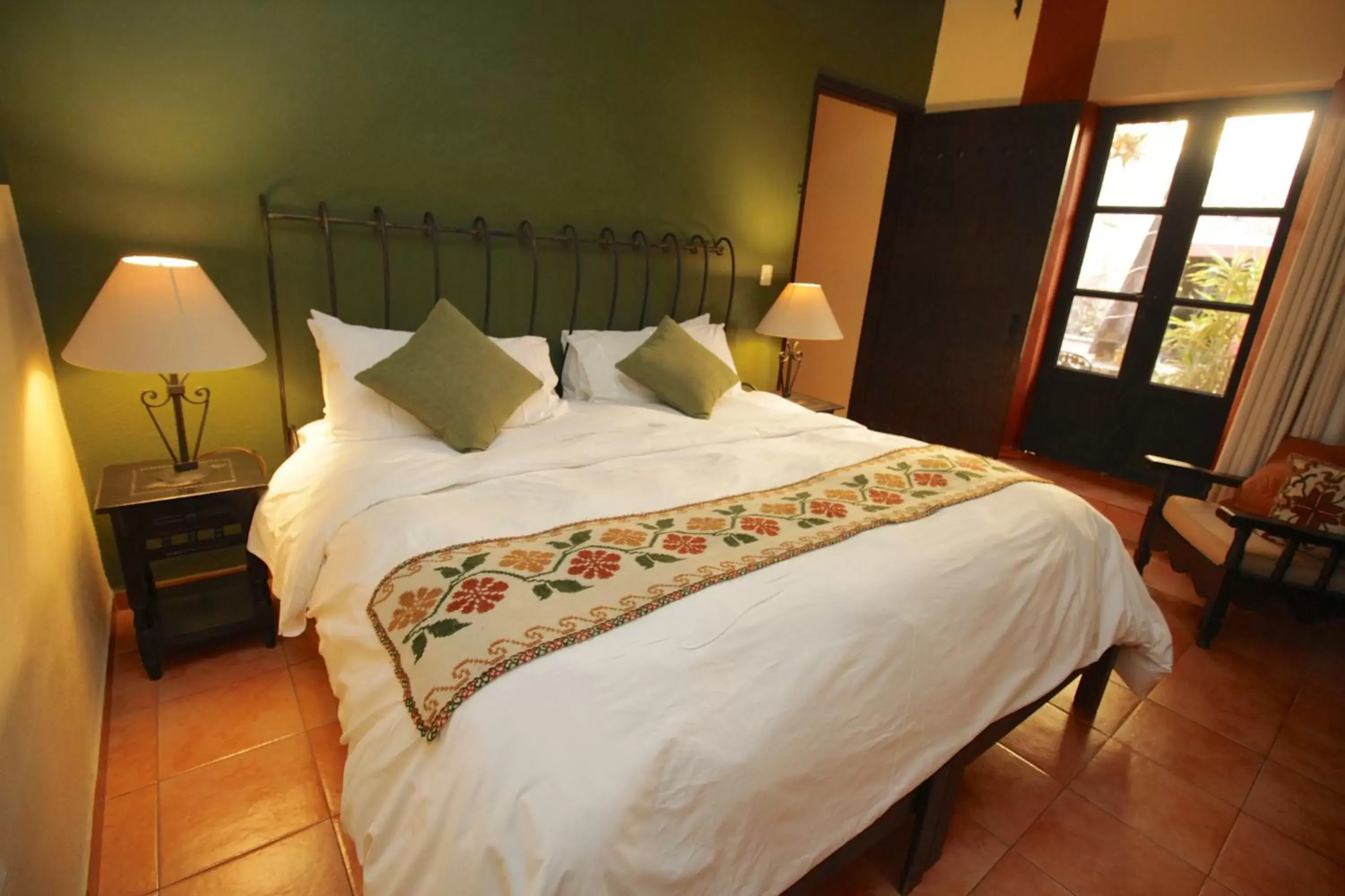 Bed in Casa Mia Suites