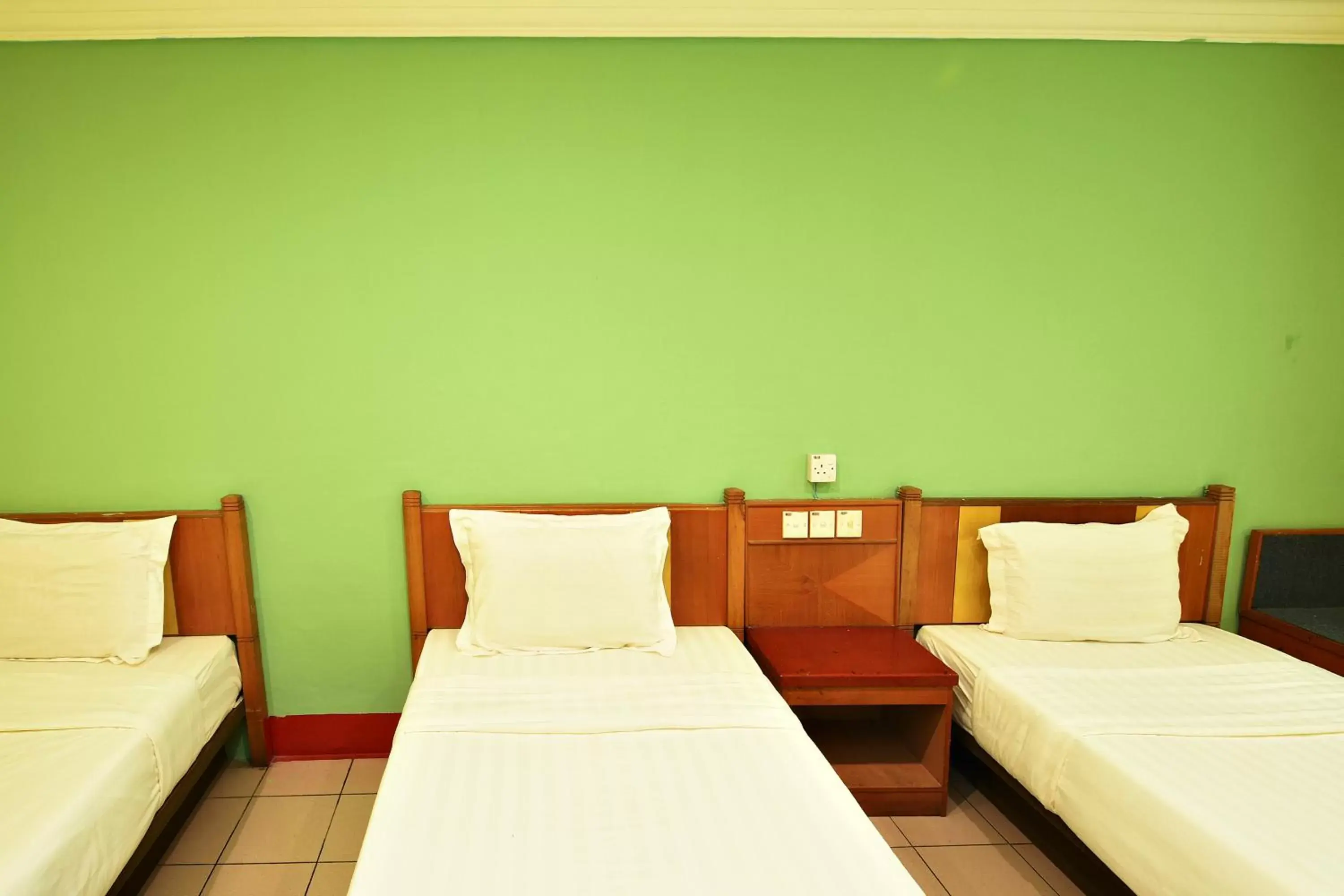 Bed in Mandarin Inn Bed in Mandarin Inn