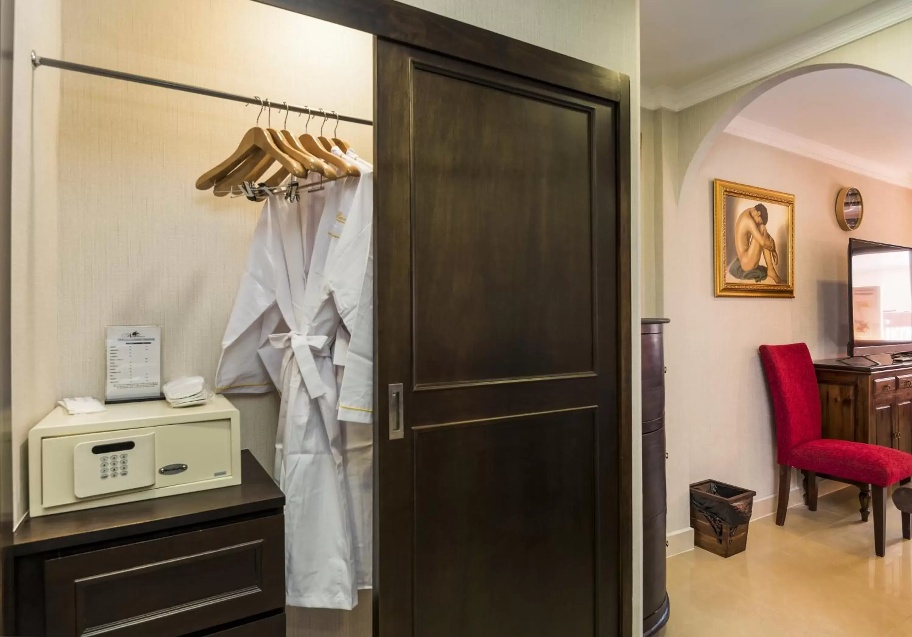 wardrobe, Bathroom in The Ambiance Hotel