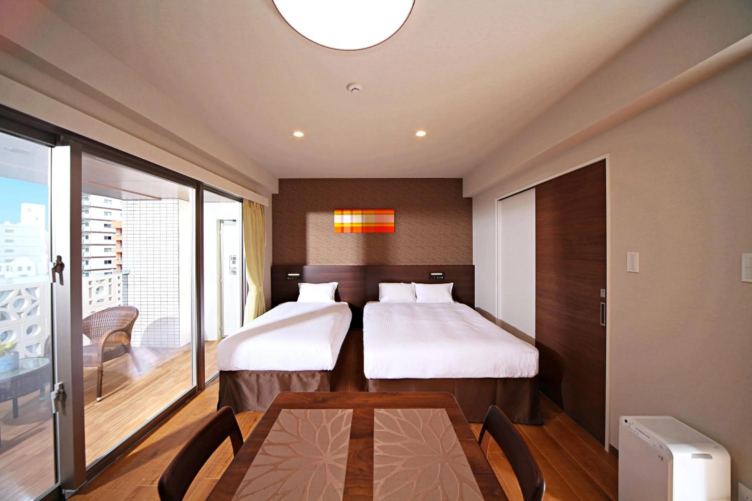 Photo of the whole room, Bed in Smart Condo Tomari