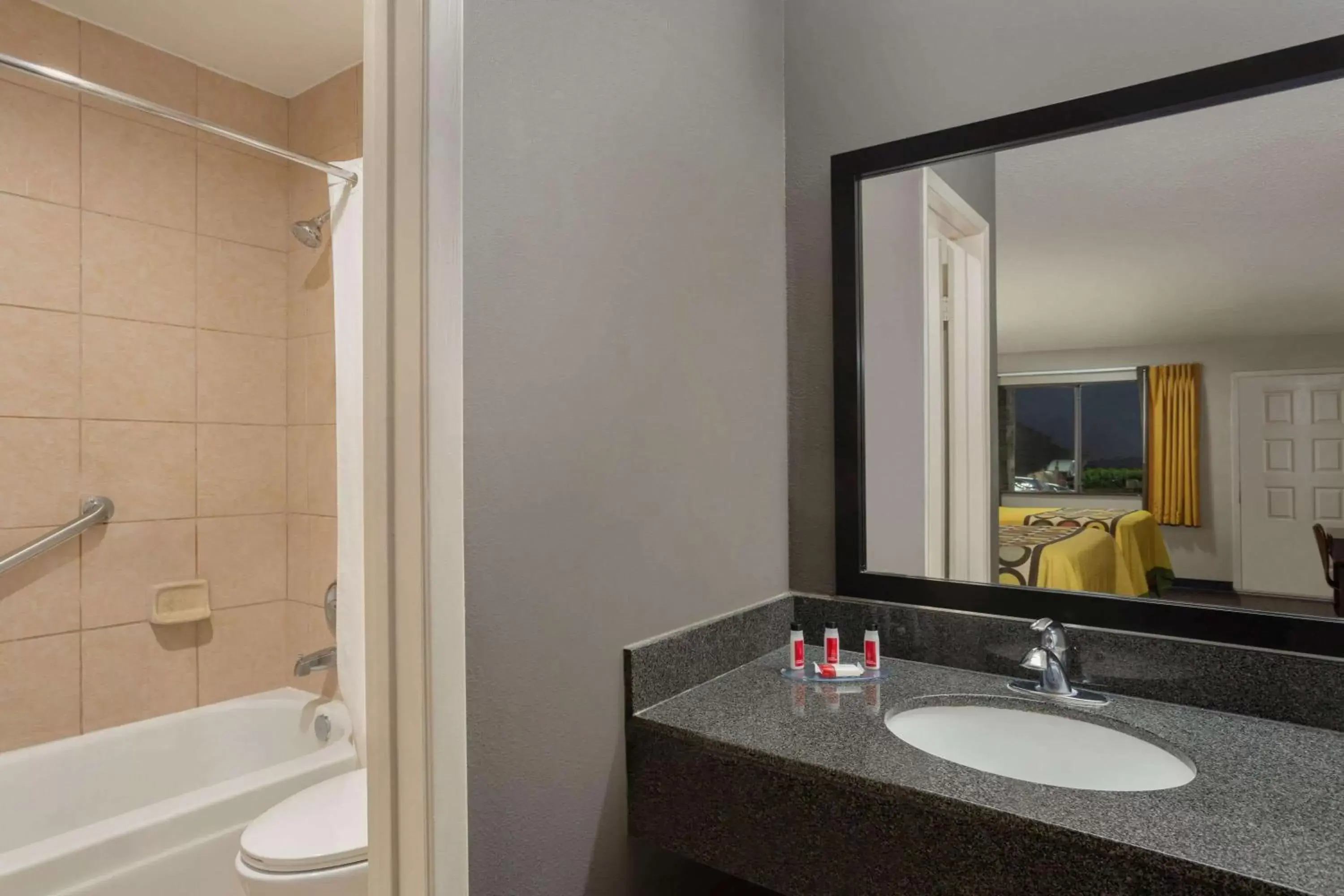 Bathroom in Super 8 by Wyndham Universal City