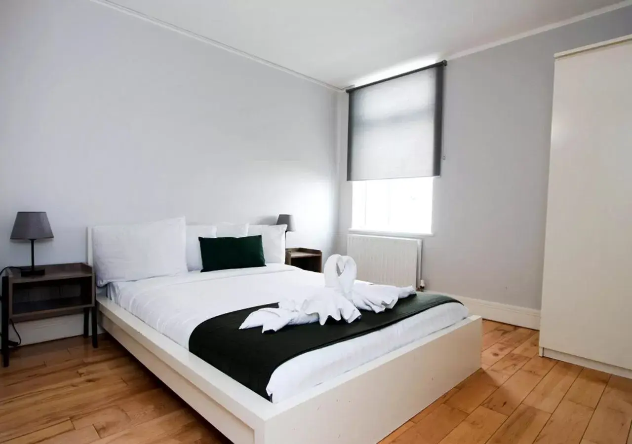 Bed in Westciti Caroco Aparthotel