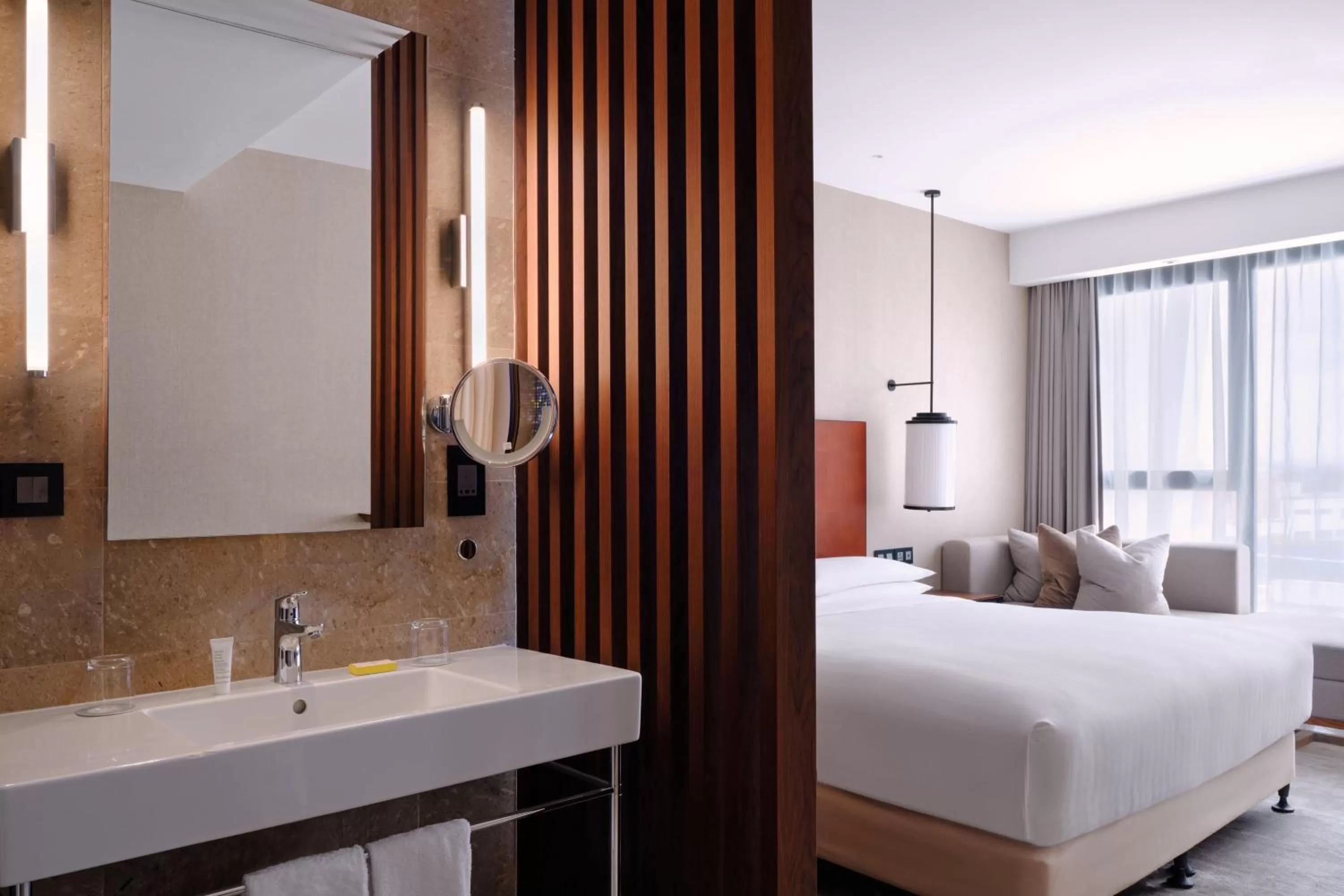 Bathroom, Bed in Tunis Marriott Hotel