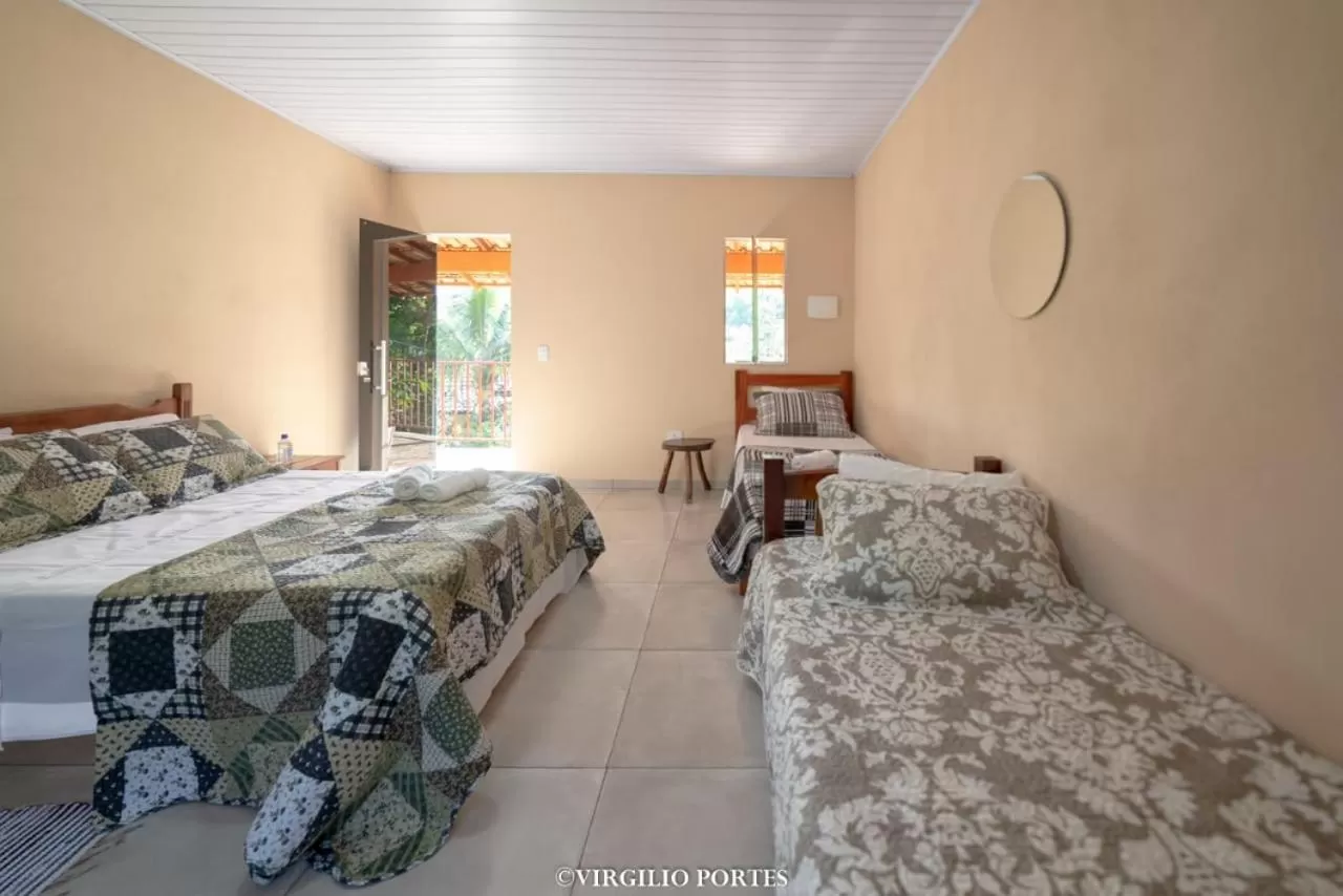 Bed in Pousada Recanto da Lu