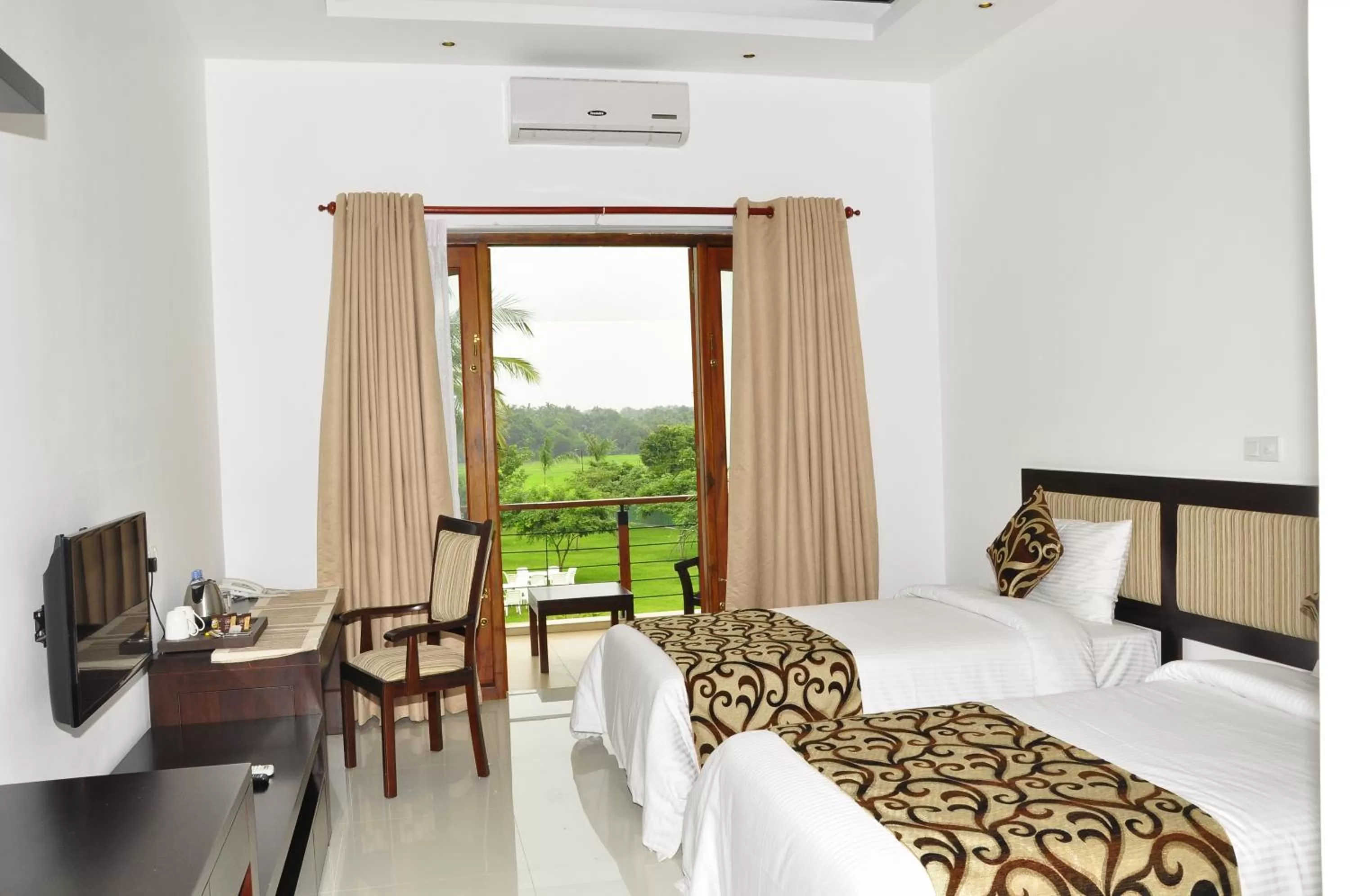 Garden view, Bed in Ruins Chaaya Hotel