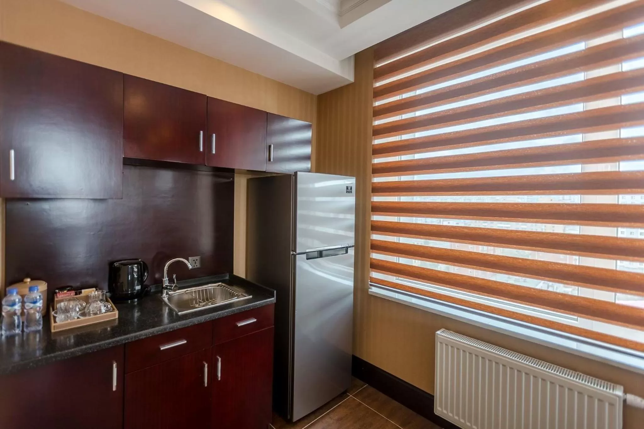 Kitchen or kitchenette in Grand Hill Hotel Ulaanbaatar