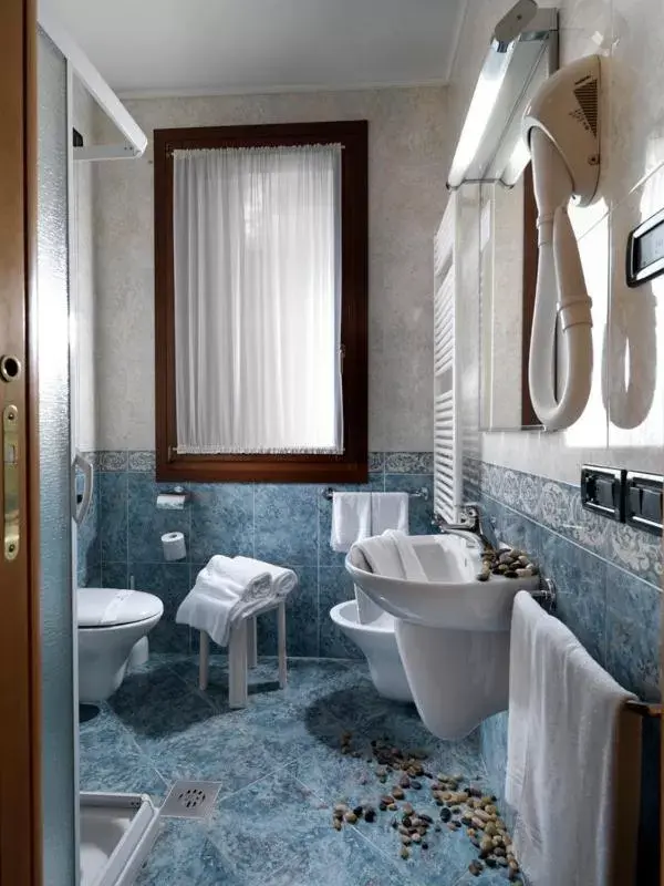 Bathroom in Hotel & Residence Roma