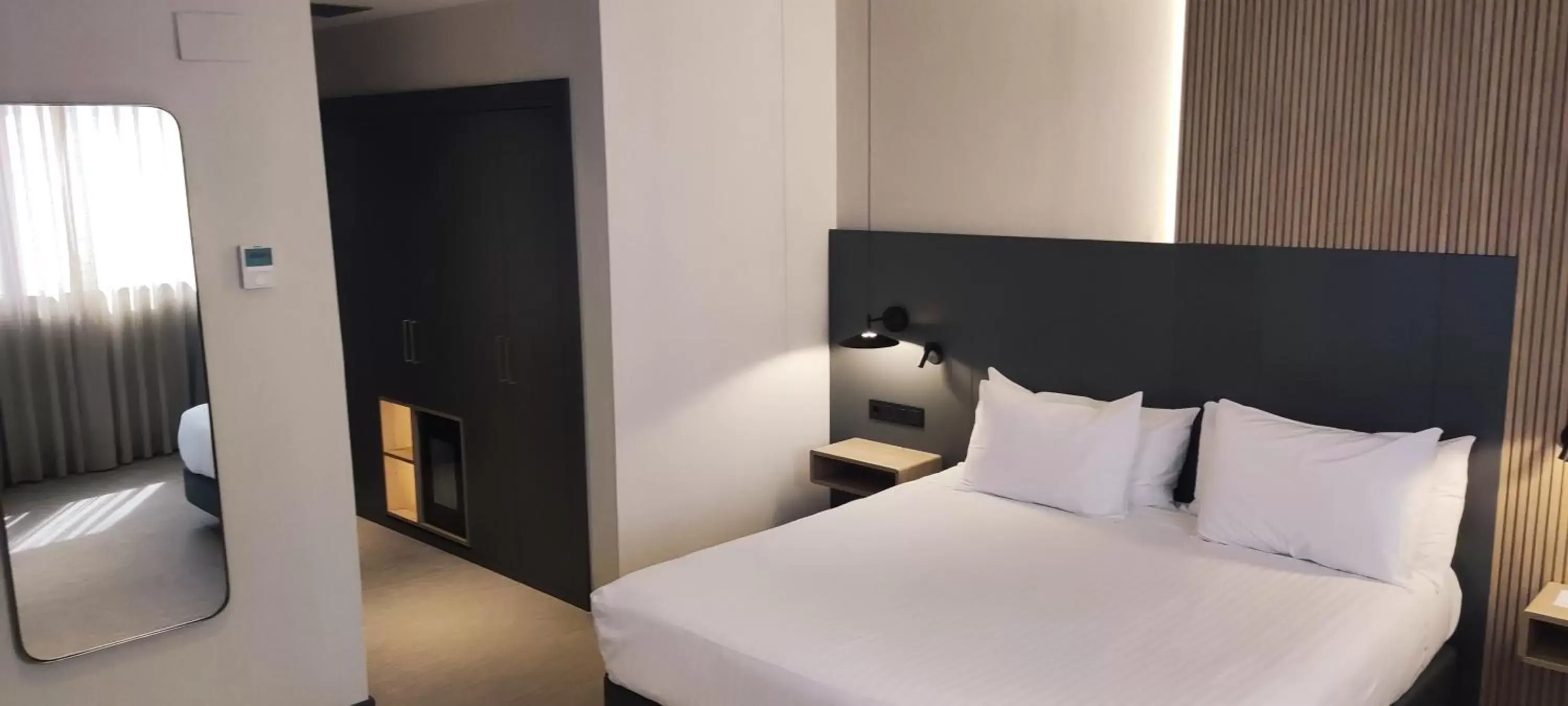 Photo of the whole room, Bed in Silken Ciudad Gijón Photo of the whole room, Bed in Silken Ciudad Gijón