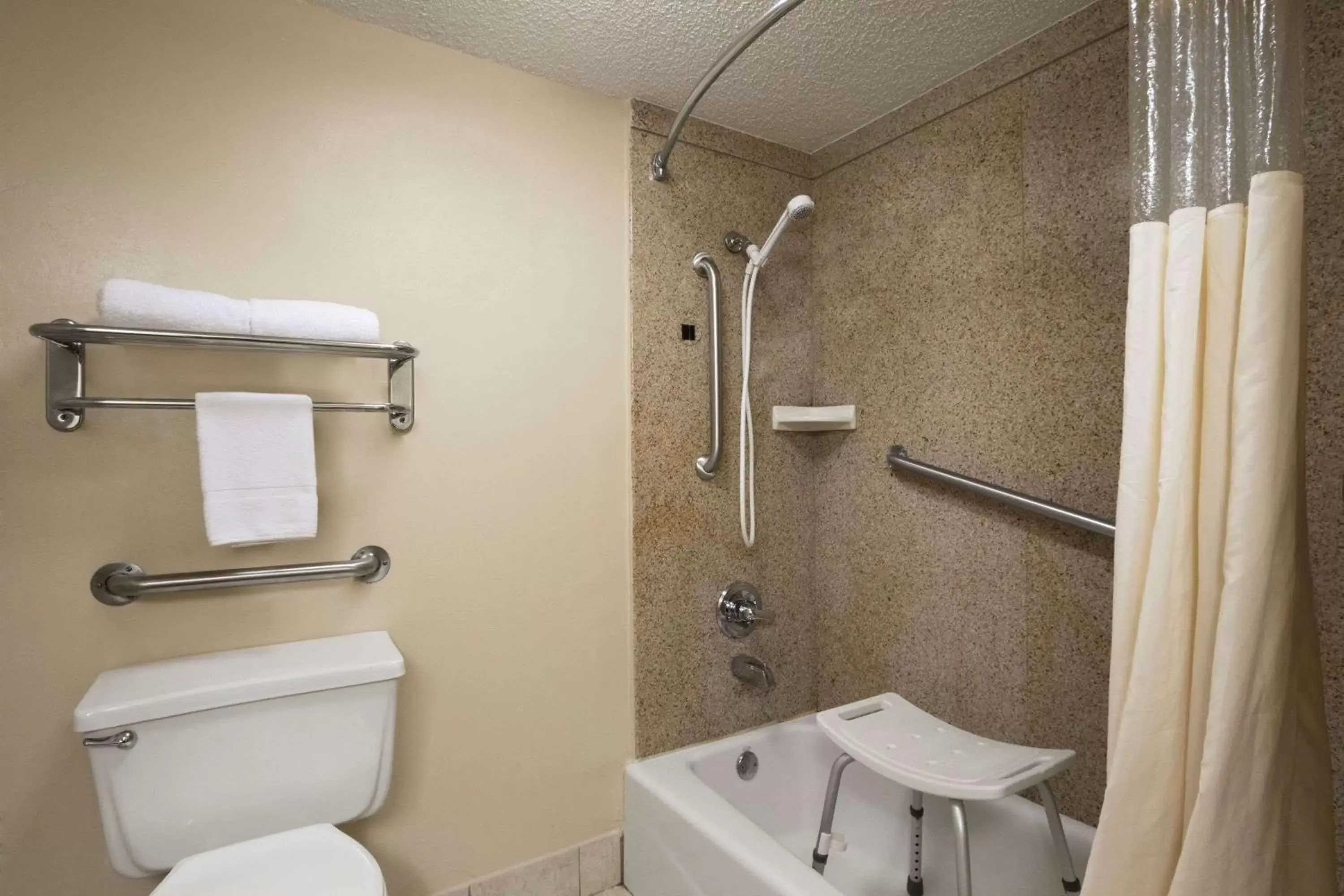 Bathroom in Days Inn & Suites by Wyndham Tuscaloosa - Univ. of Alabama