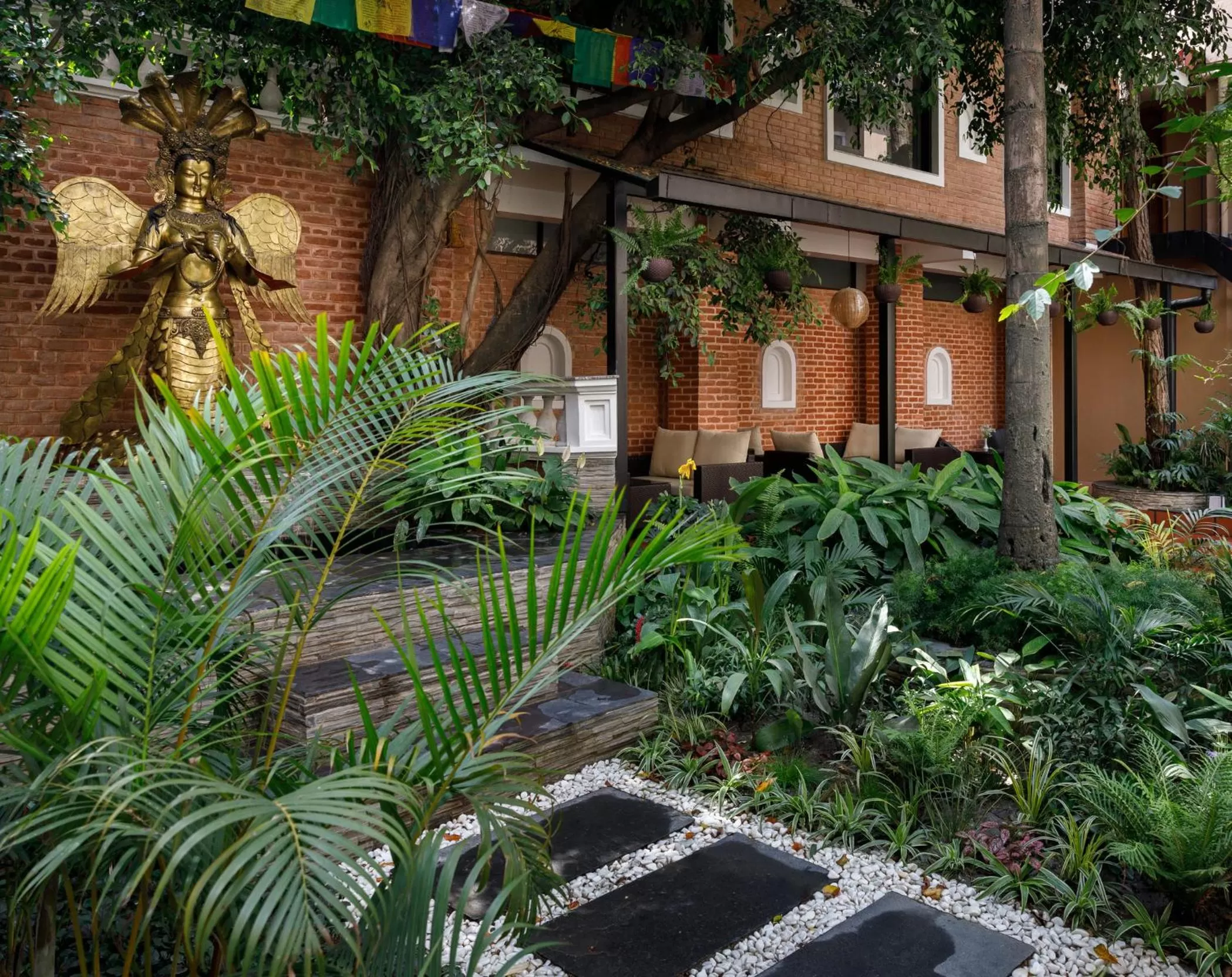 Garden in Hotel Thrive, A Tropical Courtyard
