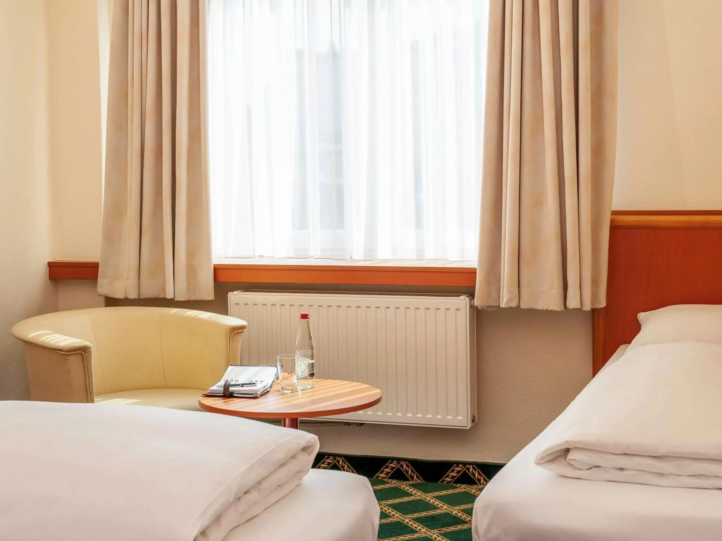 Photo of the whole room, Bed in Mercure Hotel Luebeck City Center