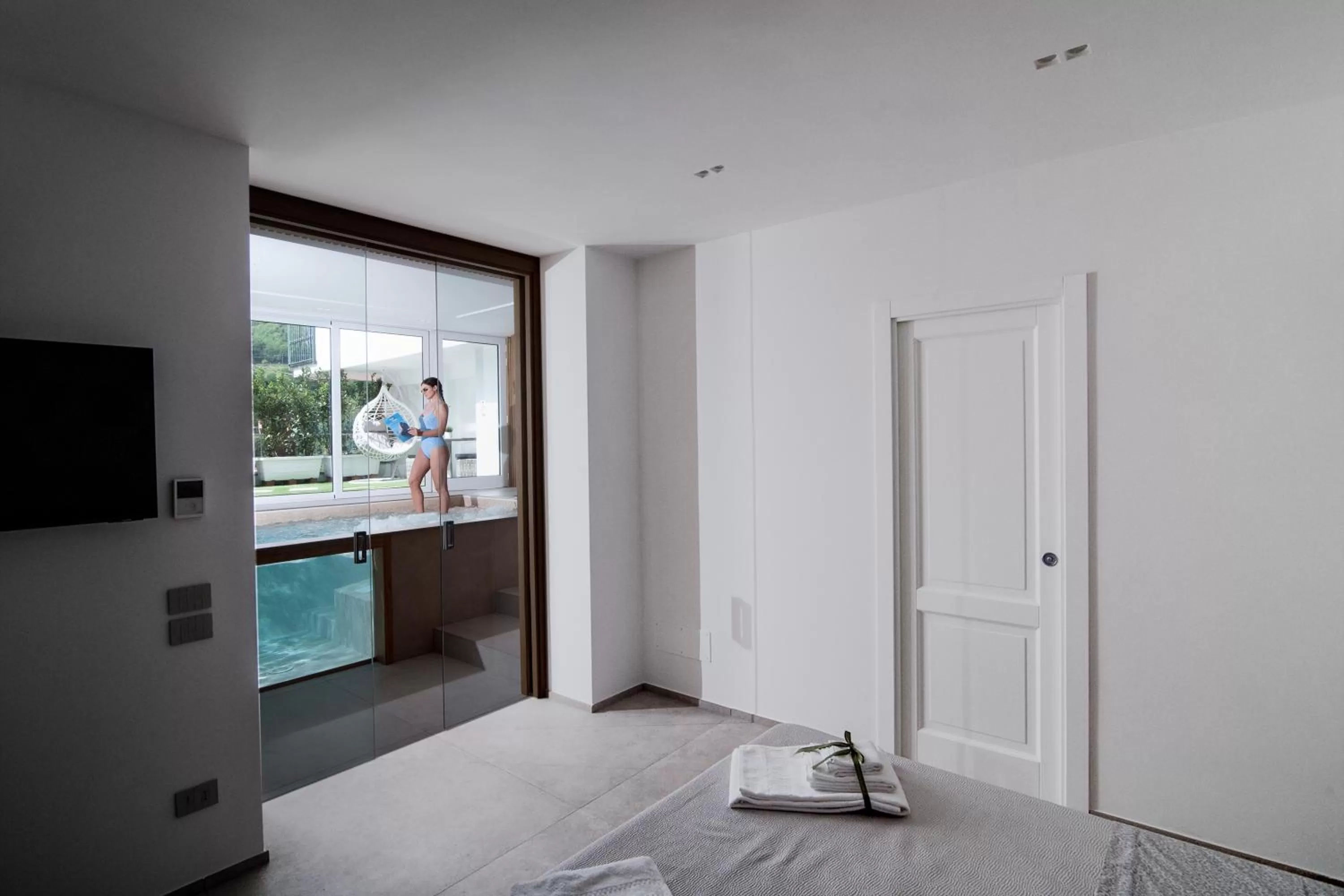 Photo of the whole room, TV/Entertainment Center in SG Suite & Spa Amalfi Coast