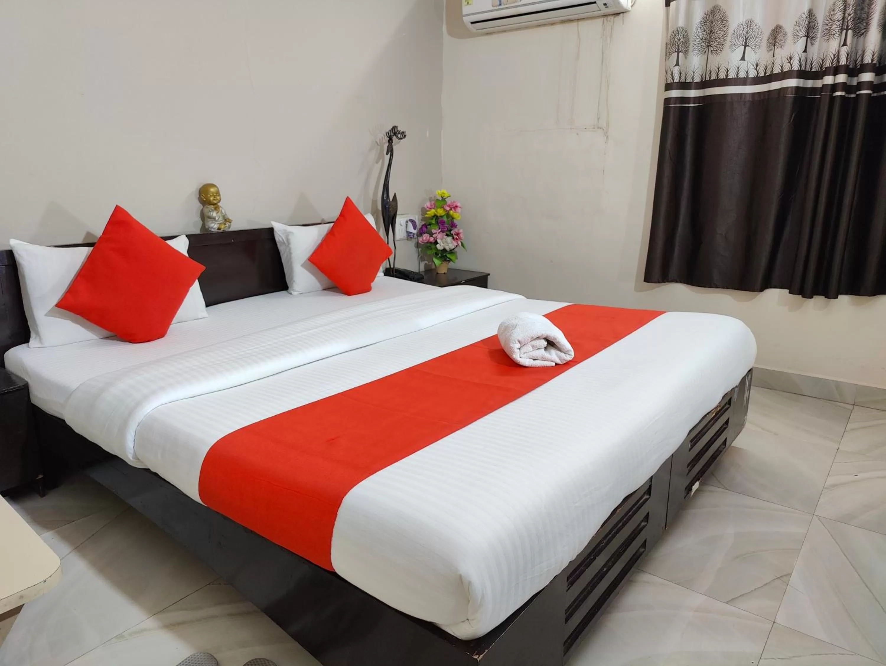 Bed in HOTEL HARMONY