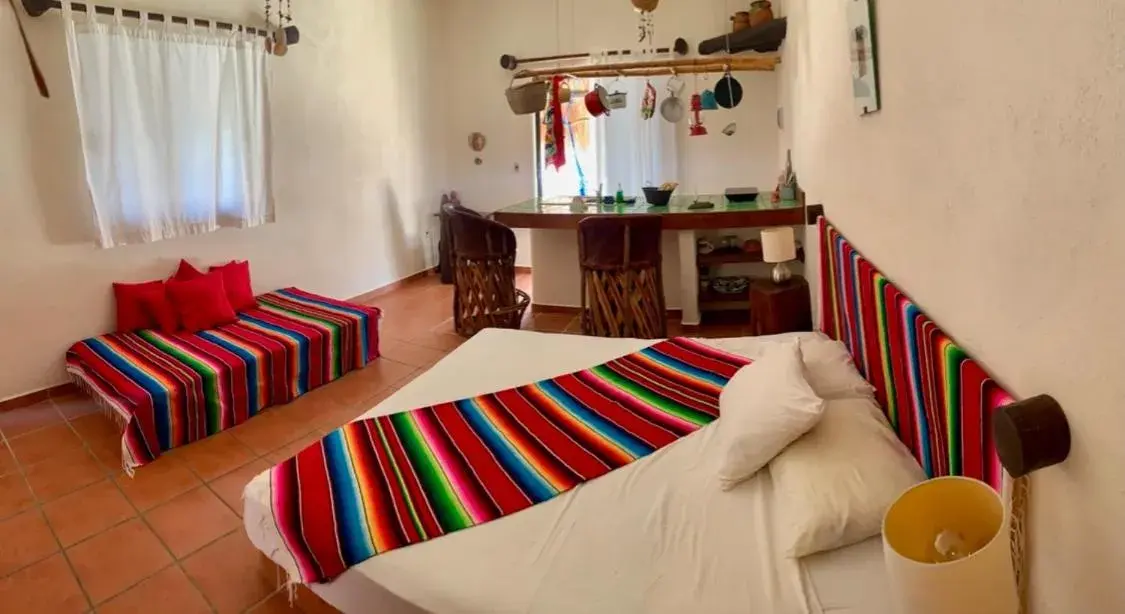 Bed in Lo Nuestro Petit Hotel Tulum